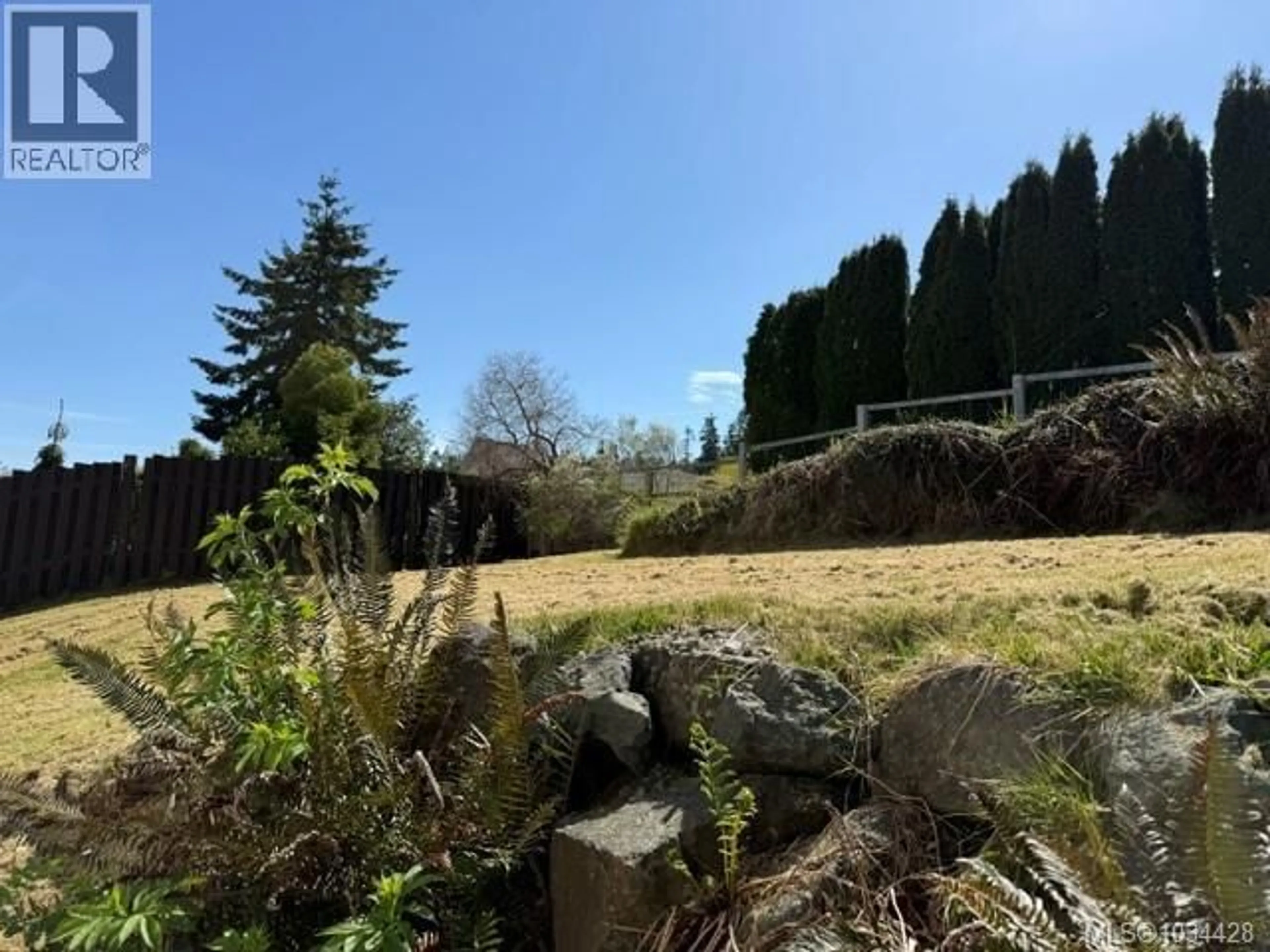 A pic from outside/outdoor area/front of a property/back of a property/a pic from drone, forest/trees view for 6140 HUCKLEBERRY LANE, Port Hardy British Columbia V0N2P0