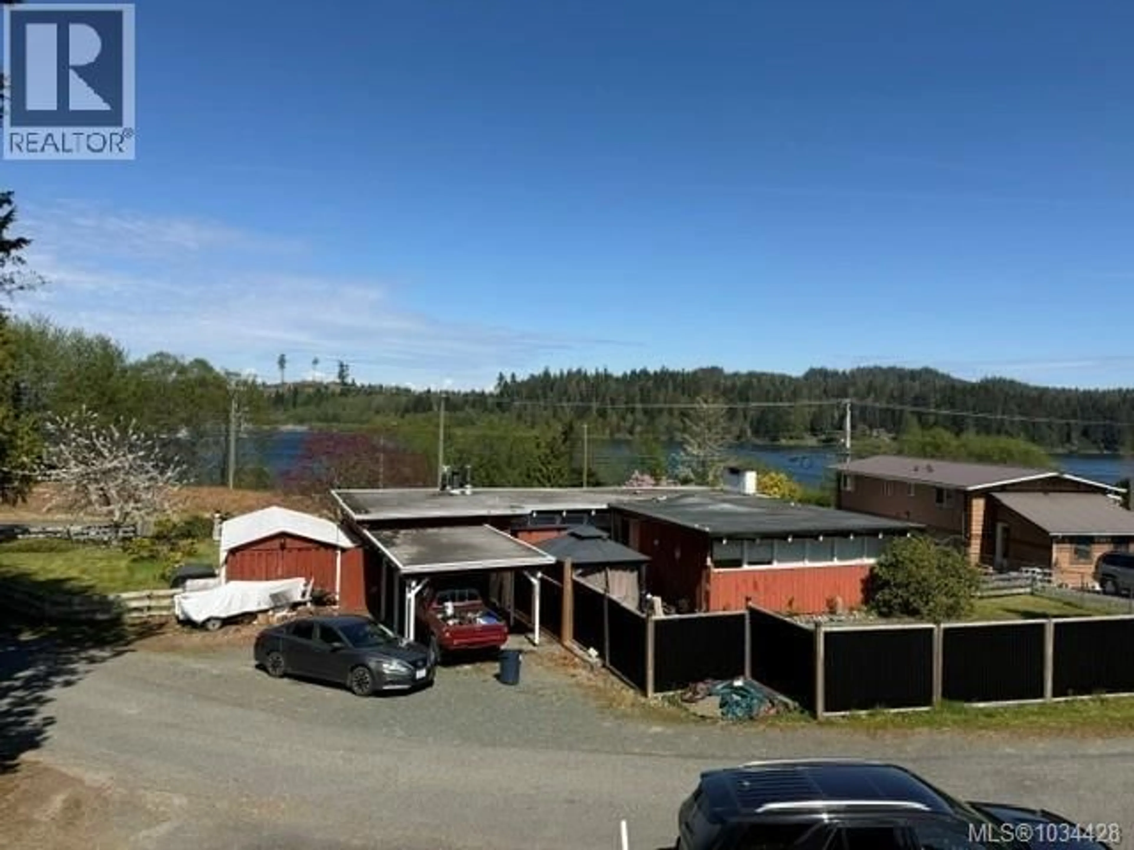 A pic from outside/outdoor area/front of a property/back of a property/a pic from drone, unknown for 6140 HUCKLEBERRY LANE, Port Hardy British Columbia V0N2P0