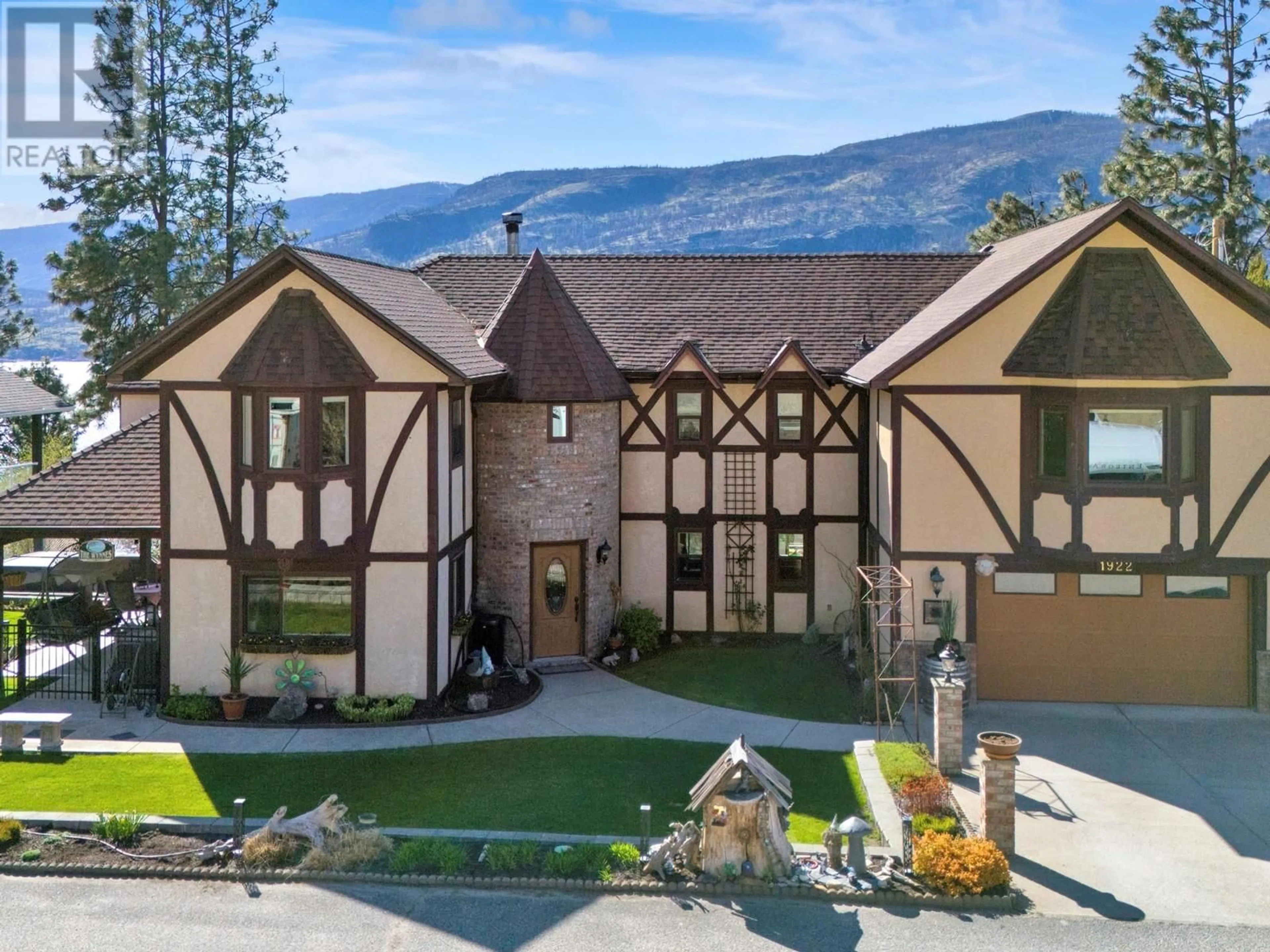 A pic from outside/outdoor area/front of a property/back of a property/a pic from drone, mountain view for 1922 PALY ROAD, Kelowna British Columbia V1V2B9