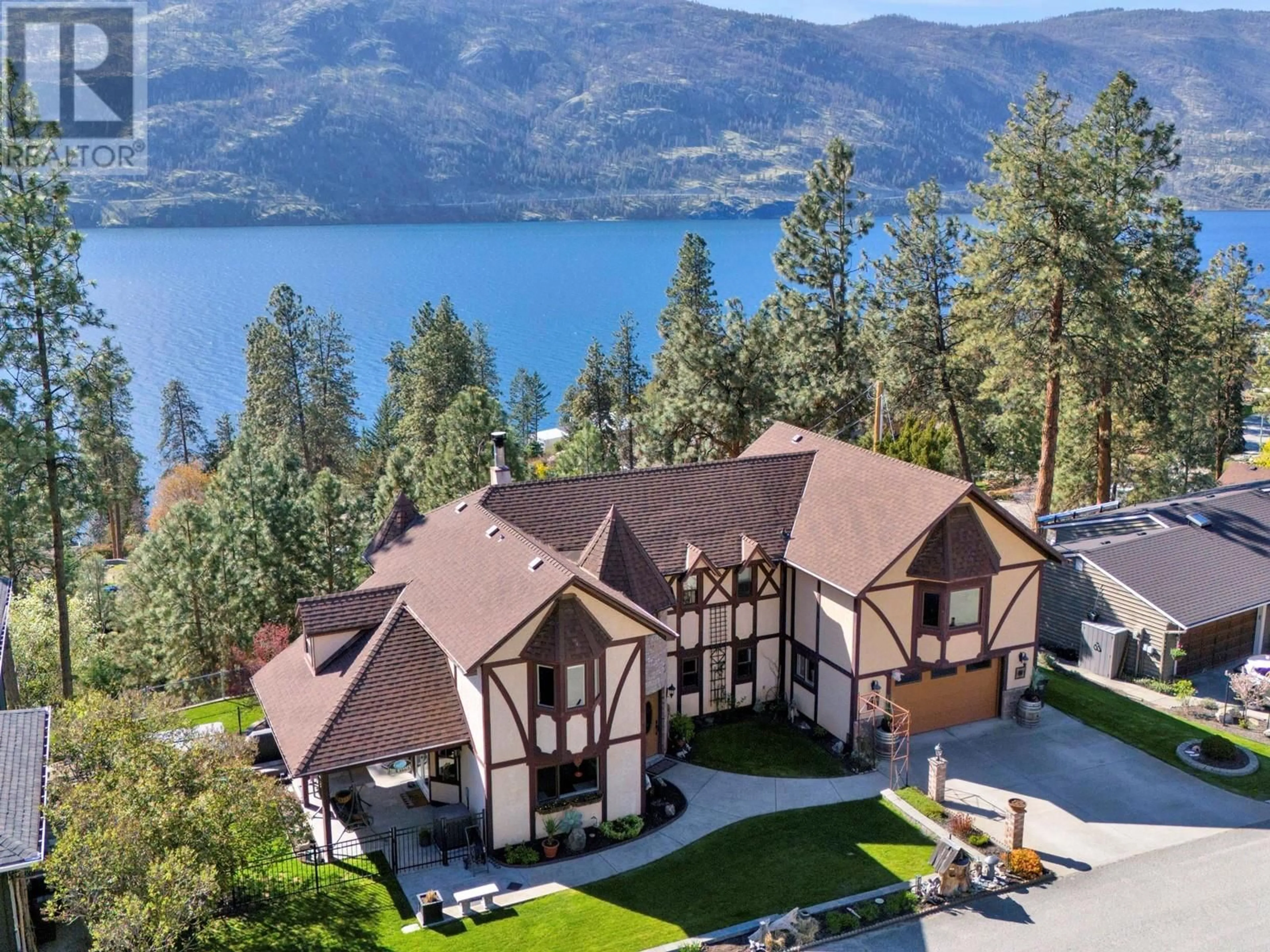 A pic from outside/outdoor area/front of a property/back of a property/a pic from drone, water/lake/river/ocean view for 1922 PALY ROAD, Kelowna British Columbia V1V2B9