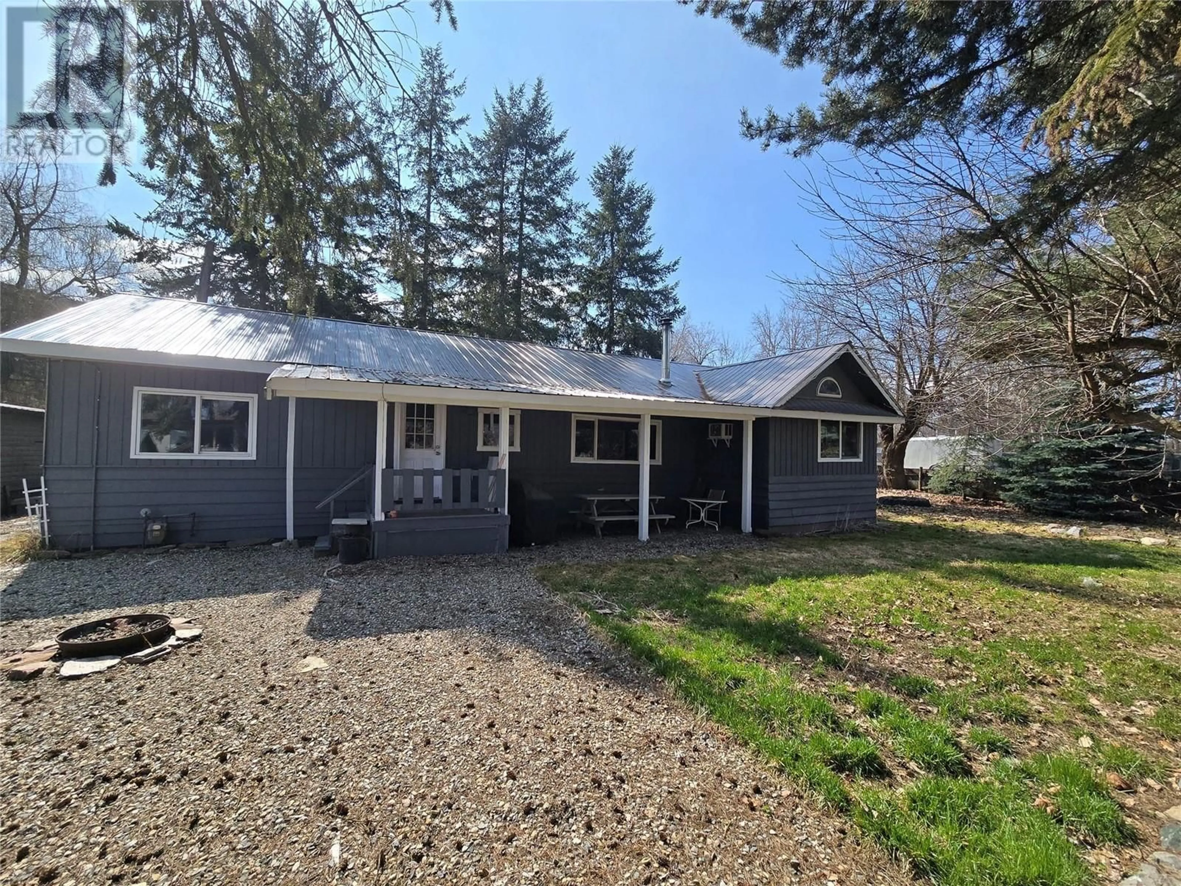 A pic from outside/outdoor area/front of a property/back of a property/a pic from drone, street for 10 BLOOM ROAD, Lumby British Columbia V0E2G7