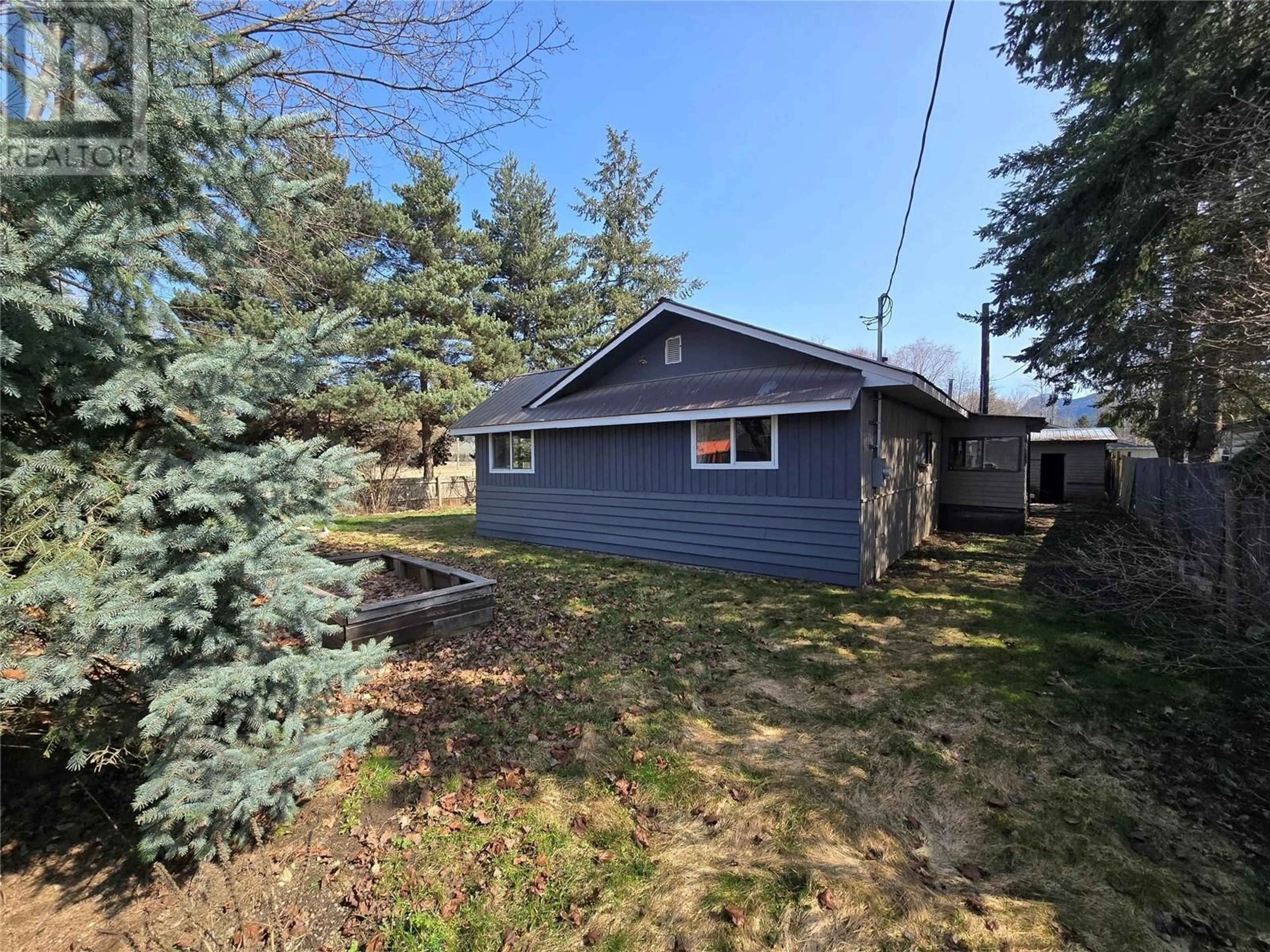 A pic from outside/outdoor area/front of a property/back of a property/a pic from drone, street for 10 BLOOM ROAD, Lumby British Columbia V0E2G7
