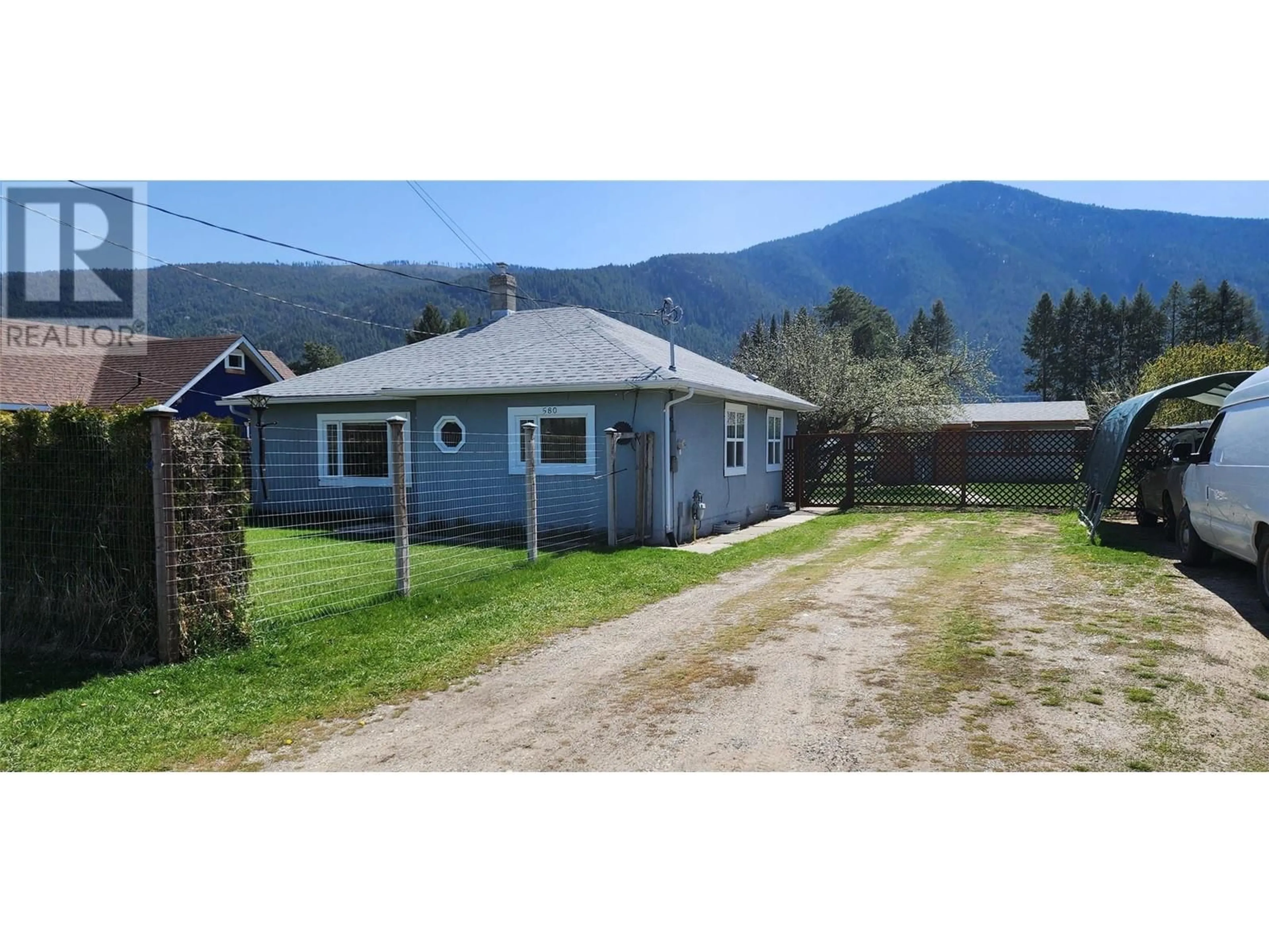 A pic from outside/outdoor area/front of a property/back of a property/a pic from drone, mountain view for 580 CAMERON AVENUE, Grand Forks British Columbia V0H1H4