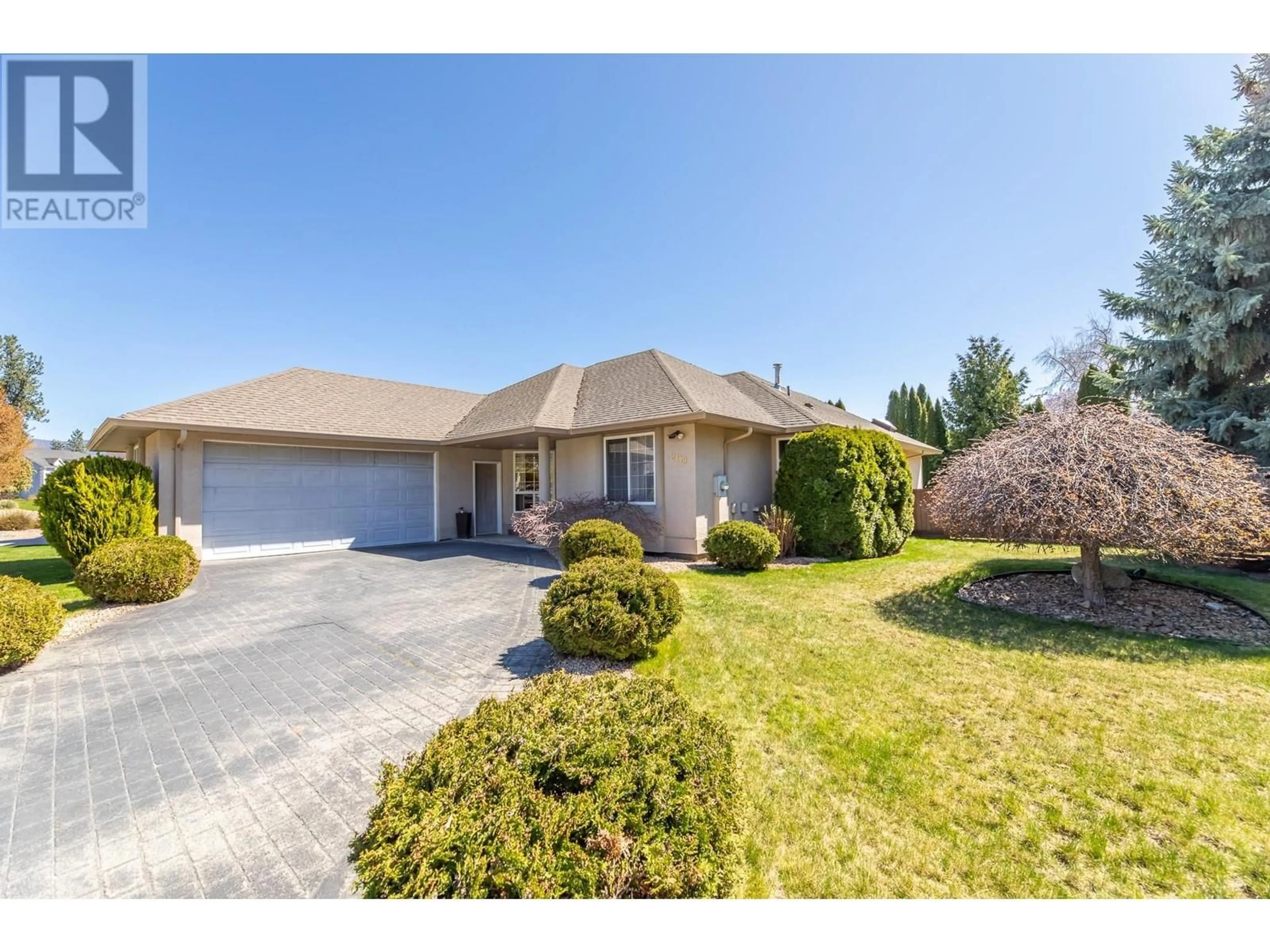 A pic from outside/outdoor area/front of a property/back of a property/a pic from drone, street for 2149 SANDSTONE DRIVE, Penticton British Columbia V2A8Y7