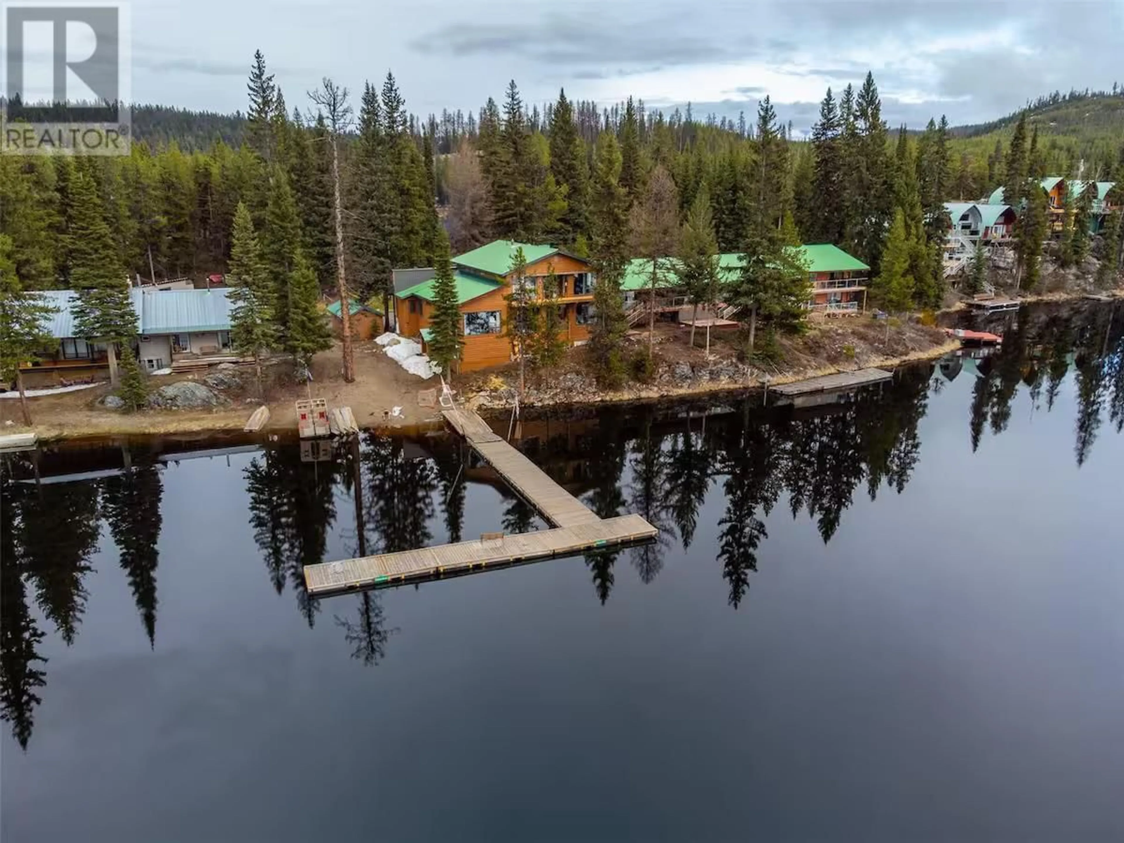 A pic from outside/outdoor area/front of a property/back of a property/a pic from drone, water/lake/river/ocean view for 8 - 800 IDABEL LAKE ROAD, Kelowna British Columbia V1Y6H3