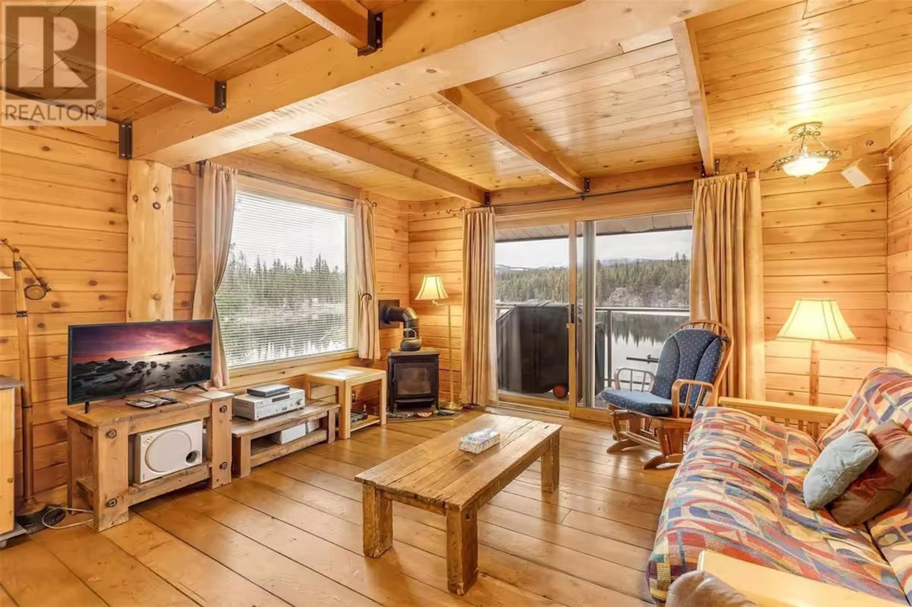 Living room with furniture, wood/laminate floor for 8 - 800 IDABEL LAKE ROAD, Kelowna British Columbia V1Y6H3