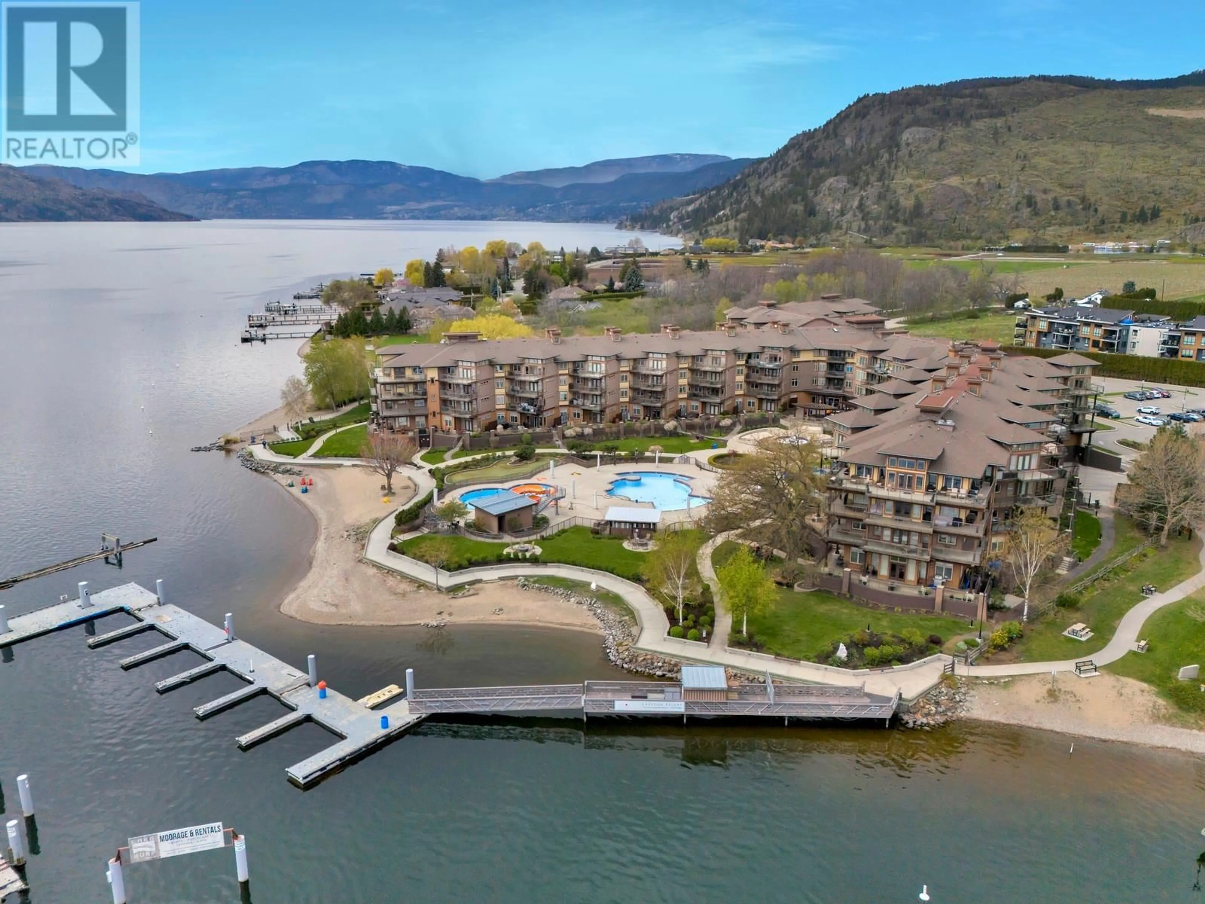 A pic from outside/outdoor area/front of a property/back of a property/a pic from drone, water/lake/river/ocean view for 409 - 4205 GELLATLY ROAD, West Kelowna British Columbia V4T2K2