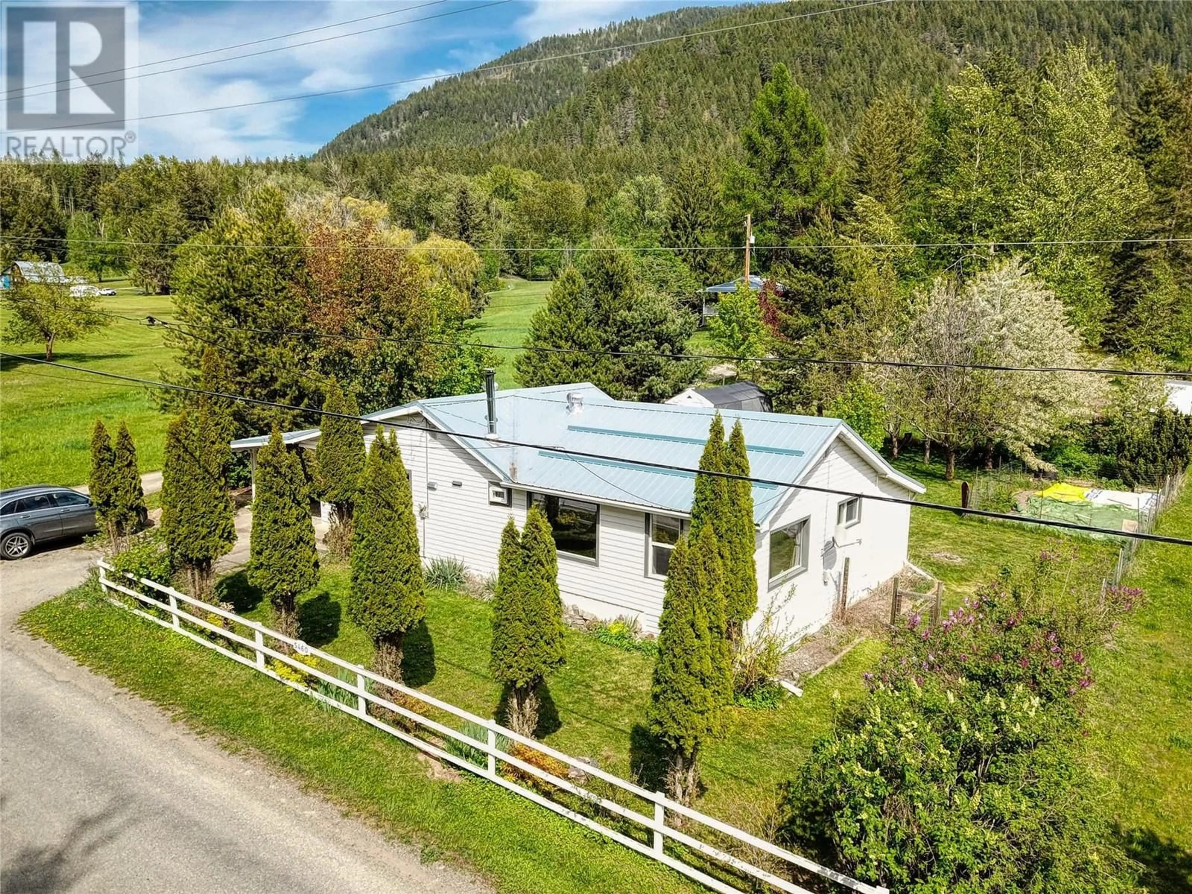 A pic from outside/outdoor area/front of a property/back of a property/a pic from drone, mountain view for 5460 WHIMSTER ROAD, Canyon British Columbia V0B1C1