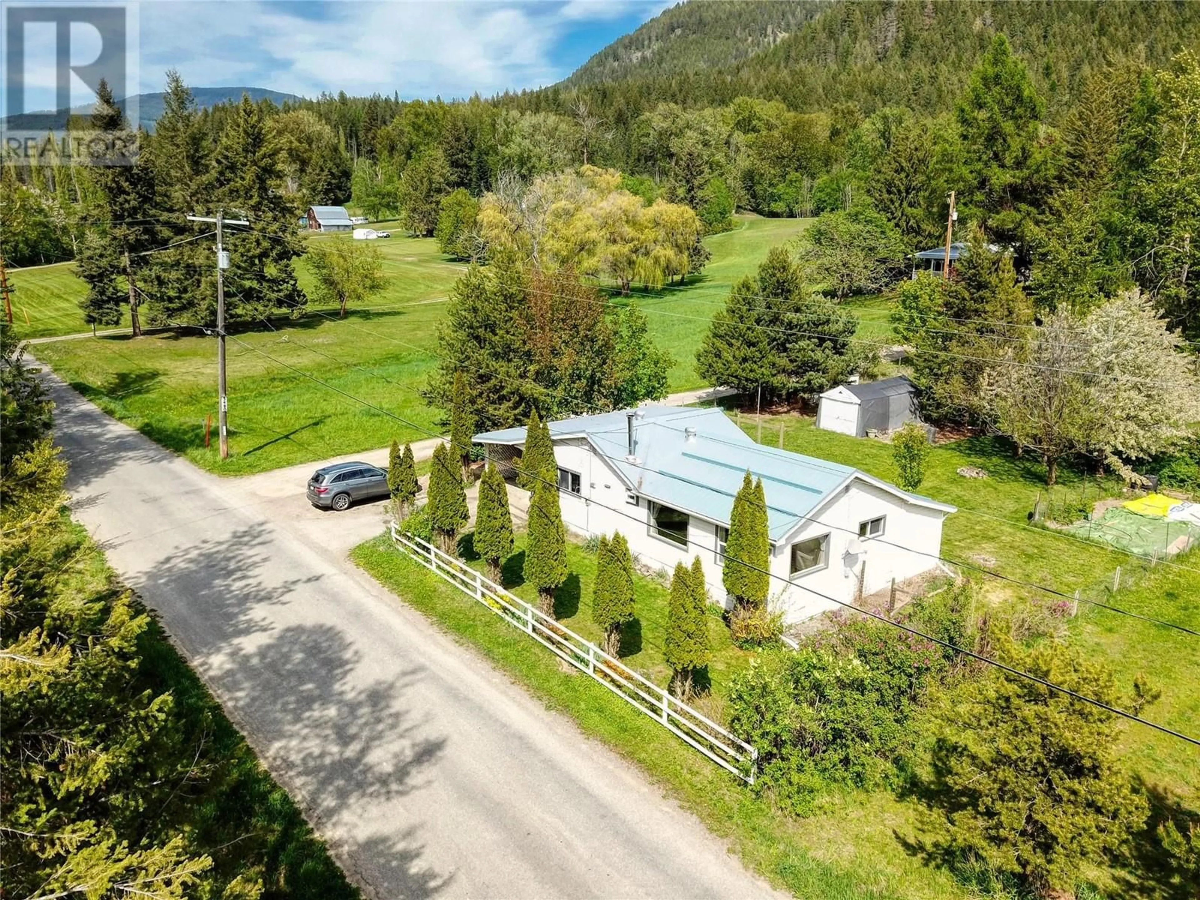 A pic from outside/outdoor area/front of a property/back of a property/a pic from drone, mountain view for 5460 WHIMSTER ROAD, Canyon British Columbia V0B1C1
