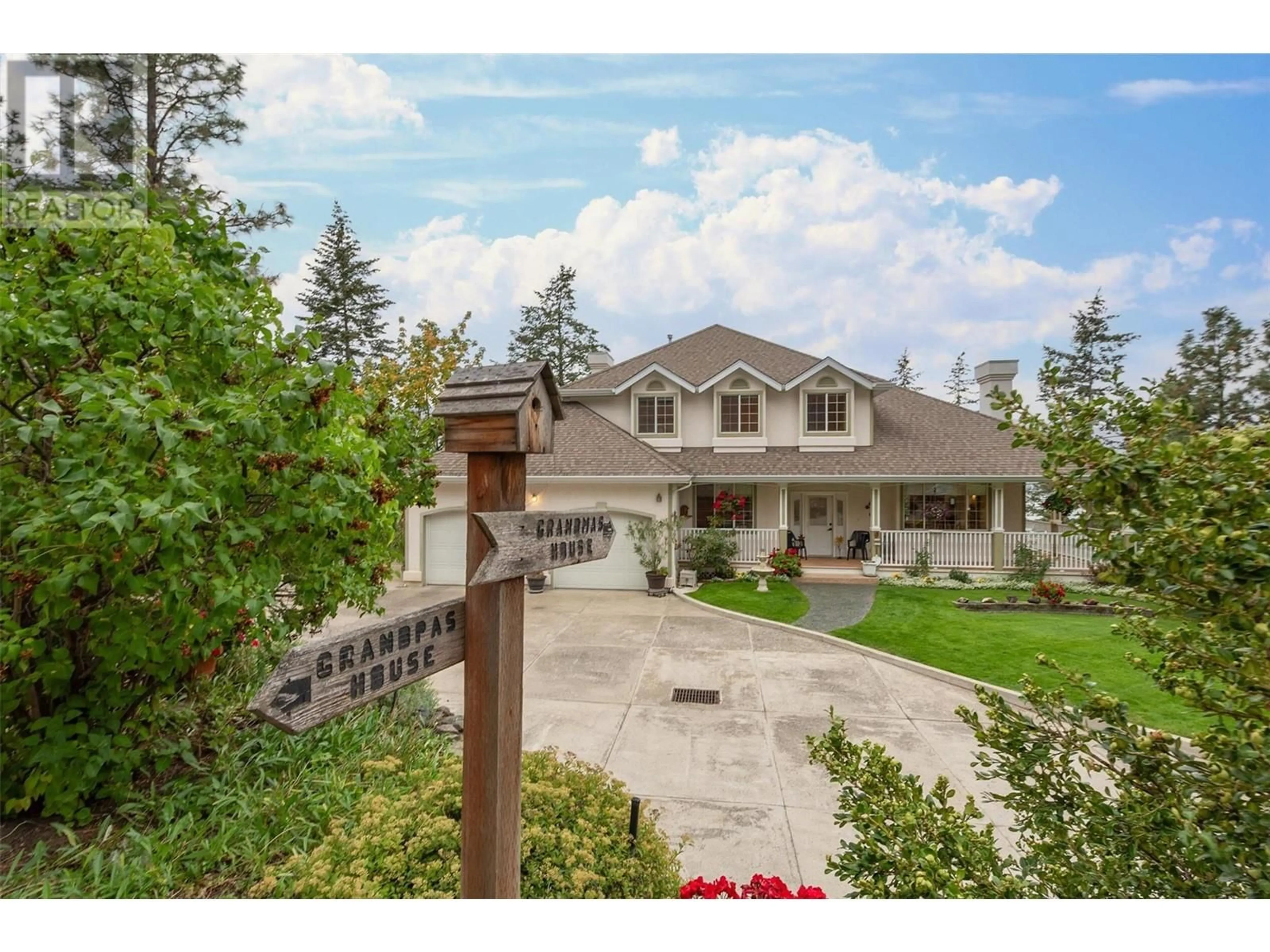 A pic from outside/outdoor area/front of a property/back of a property/a pic from drone, mountain view for 1293 CAMP ROAD, Lake Country British Columbia V4V1J9