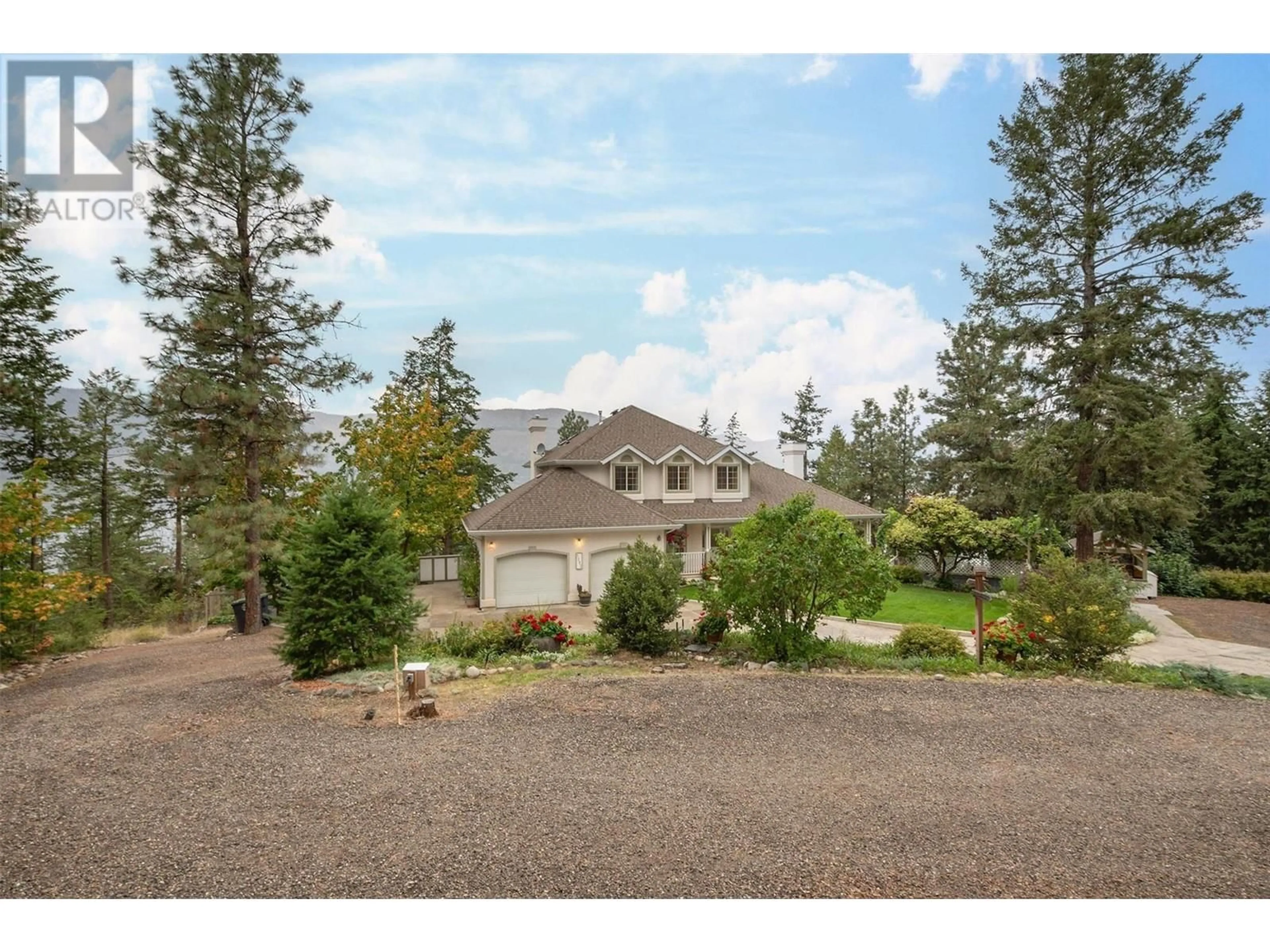 A pic from outside/outdoor area/front of a property/back of a property/a pic from drone, unknown for 1293 CAMP ROAD, Lake Country British Columbia V4V1J9