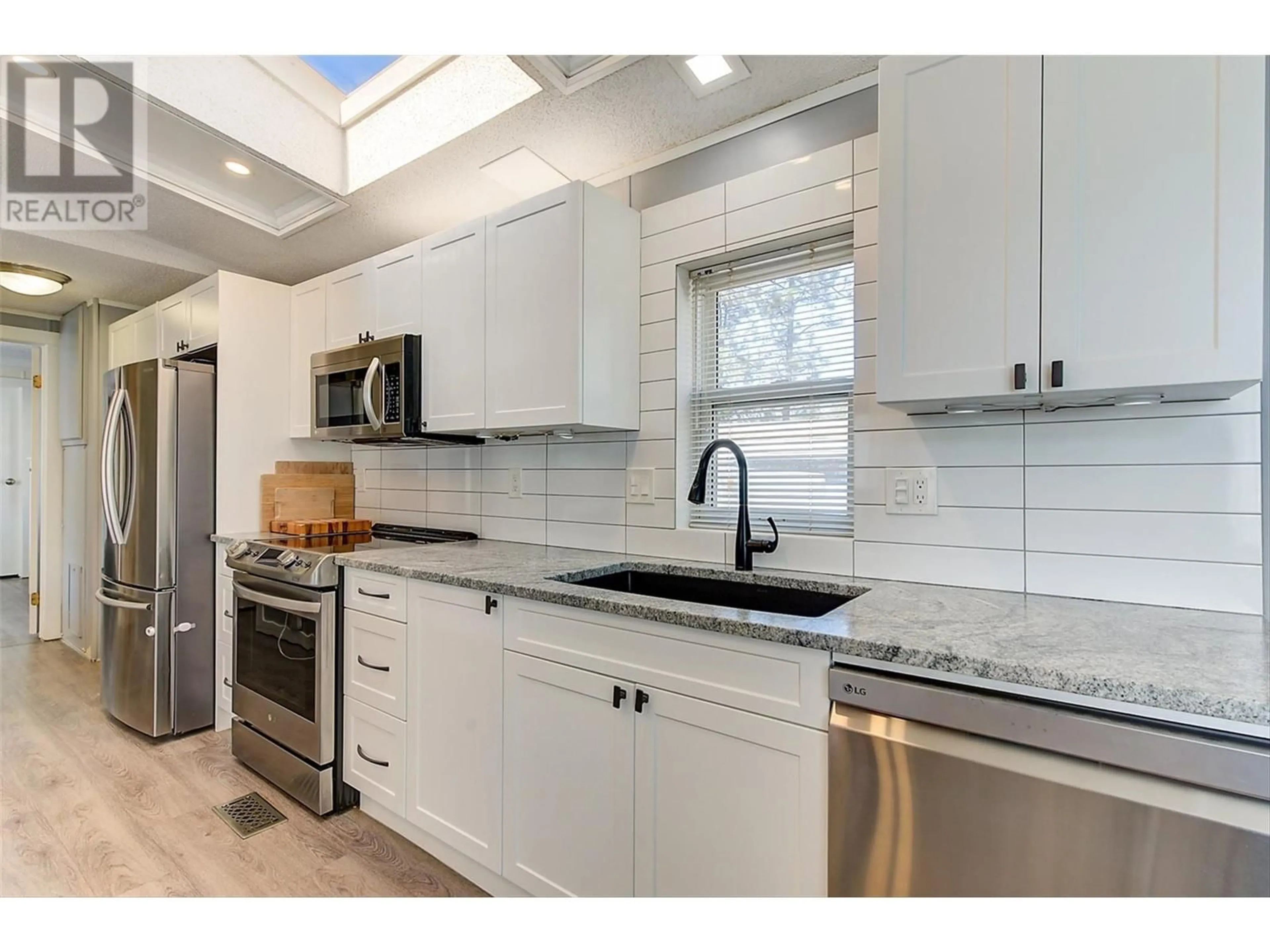 Open concept kitchen, ceramic/tile floor for 2 - 3225 SHANNON LAKE ROAD, West Kelowna British Columbia V4T2E2