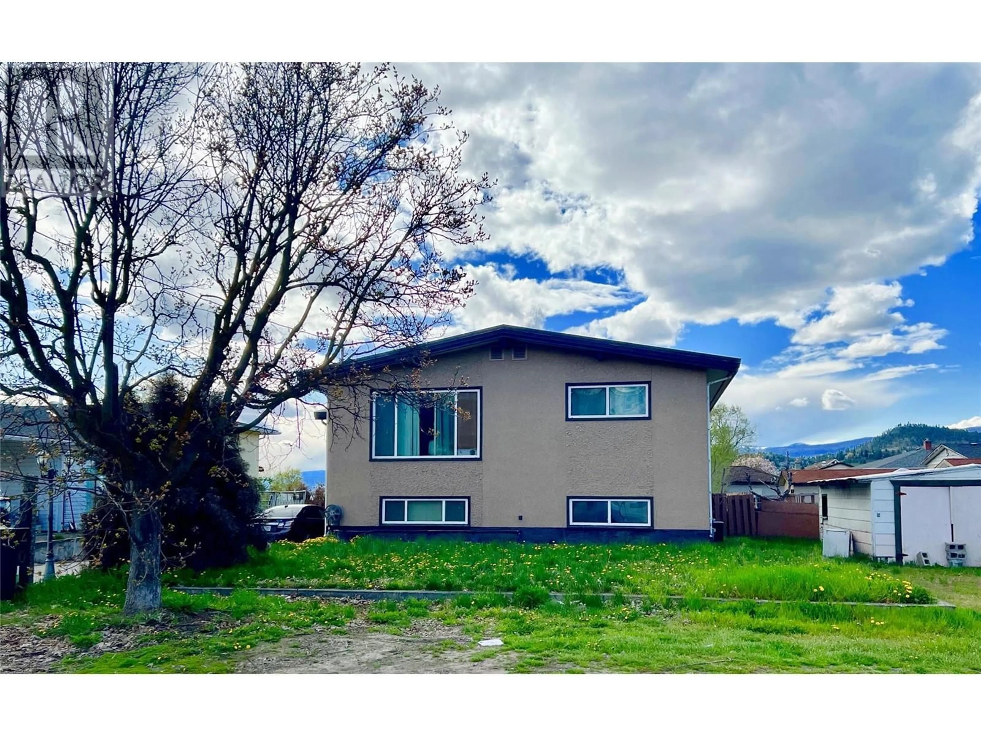 A pic from outside/outdoor area/front of a property/back of a property/a pic from drone, unknown for 520 FROELICH ROAD, Kelowna British Columbia V1X3M8