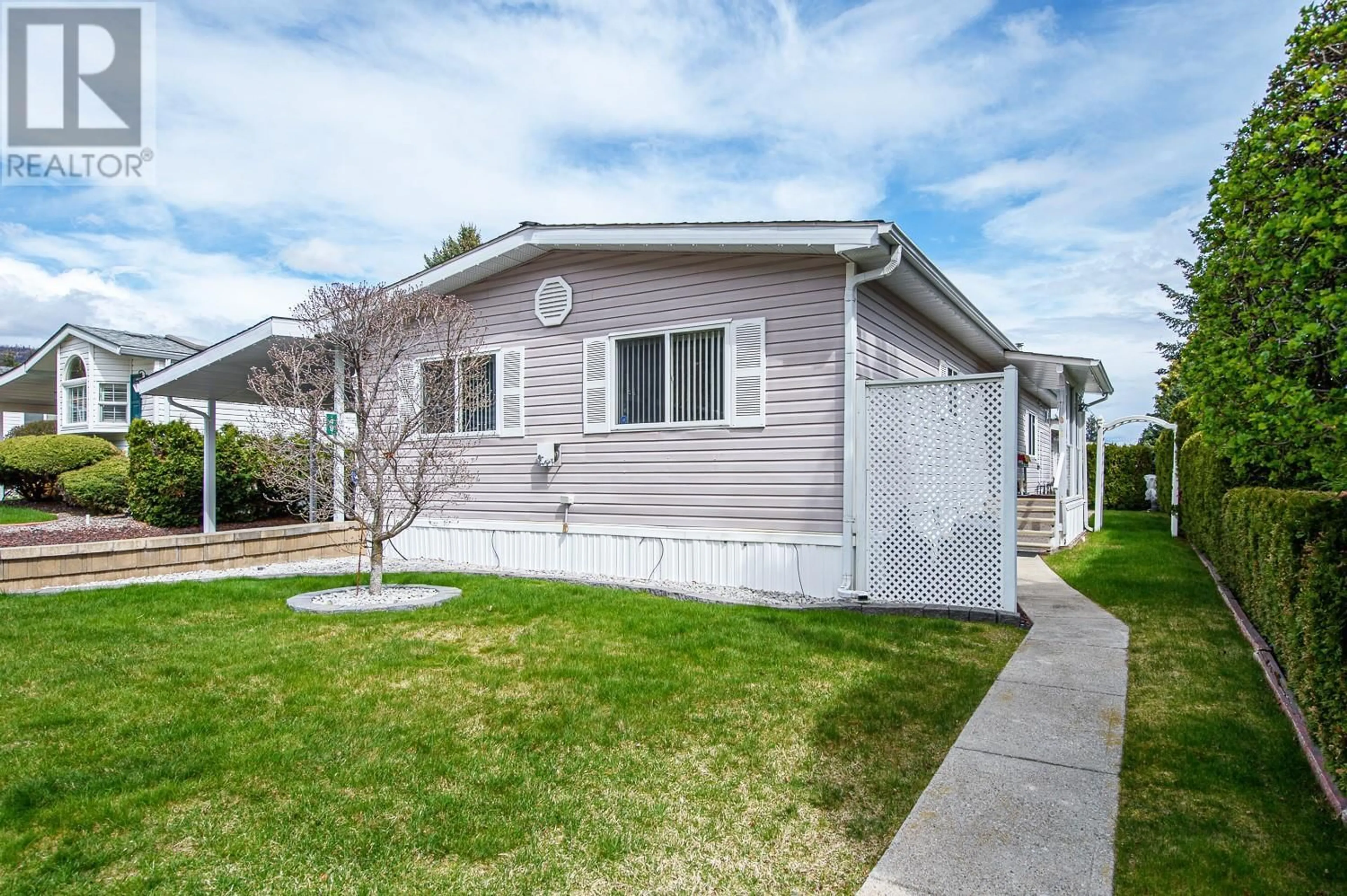 Home with vinyl exterior material, street for 49 - 1850 SHANNON LAKE ROAD, West Kelowna British Columbia V4T1L8