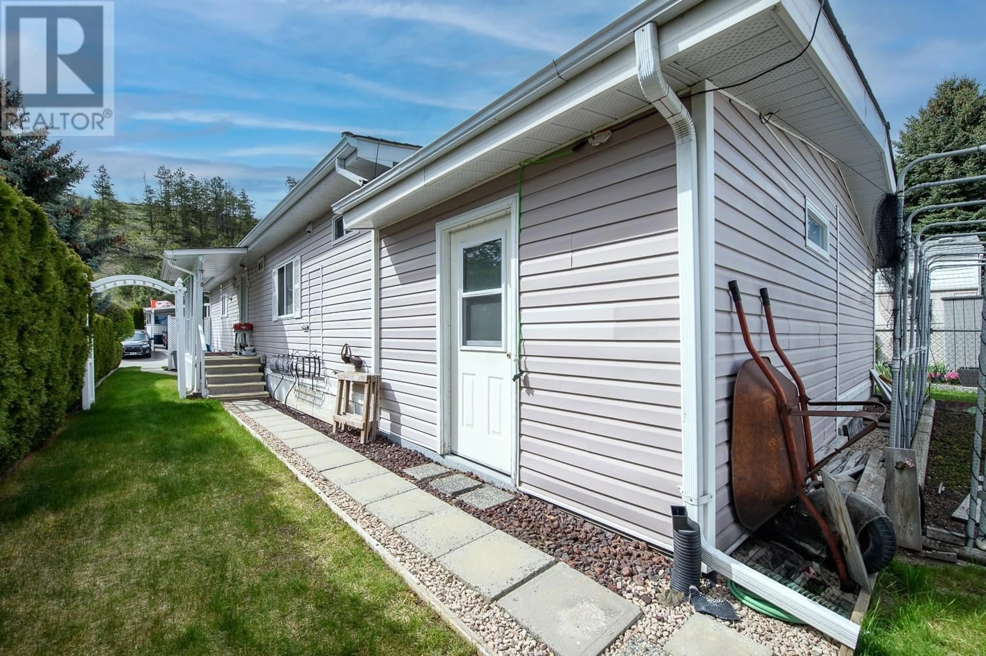 Home with vinyl exterior material, street for 49 - 1850 SHANNON LAKE ROAD, West Kelowna British Columbia V4T1L8
