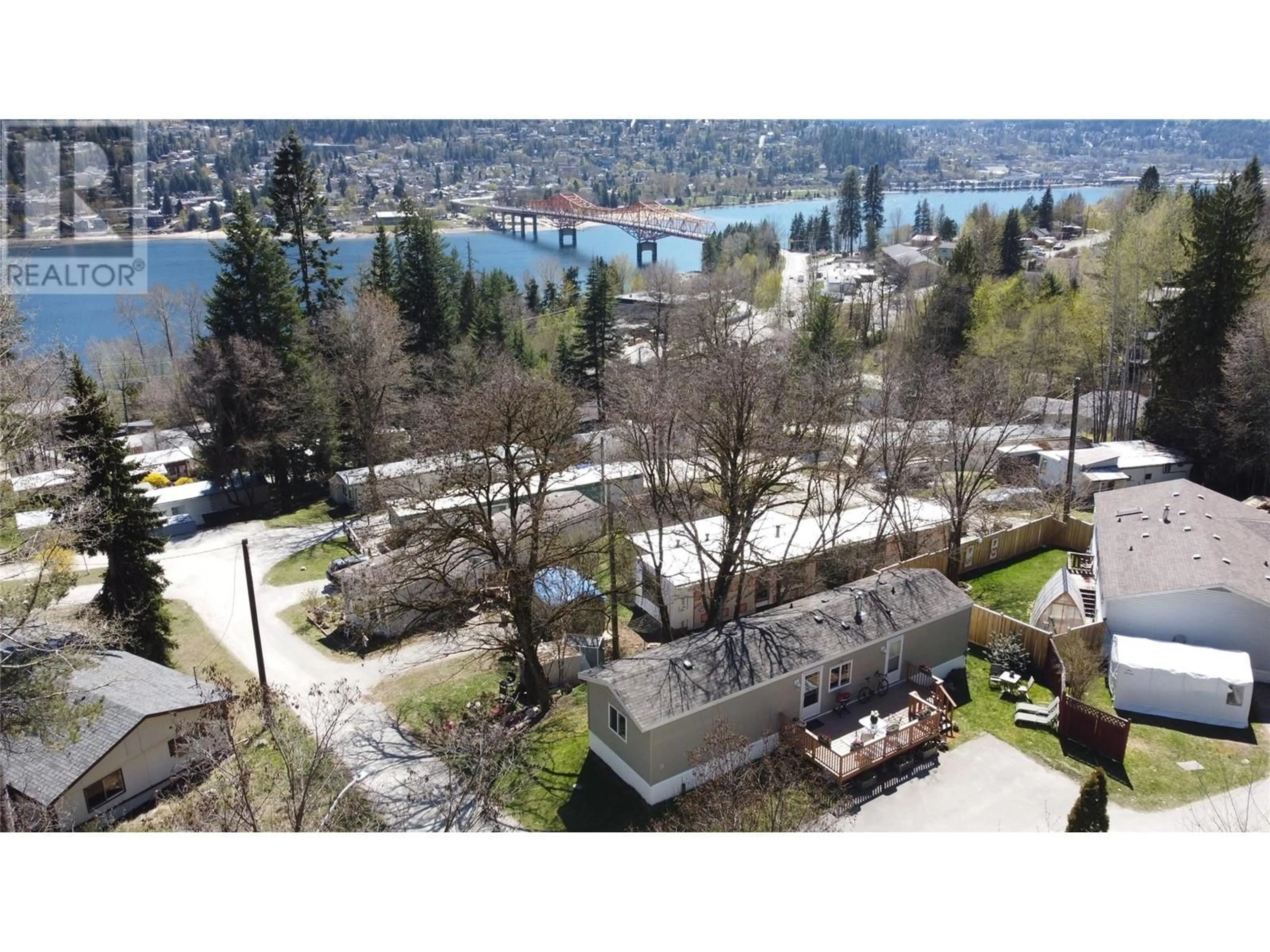 A pic from outside/outdoor area/front of a property/back of a property/a pic from drone, water/lake/river/ocean view for 58 - 739 HIGHWAY 3A HIGHWAY, Nelson British Columbia V1L6M5