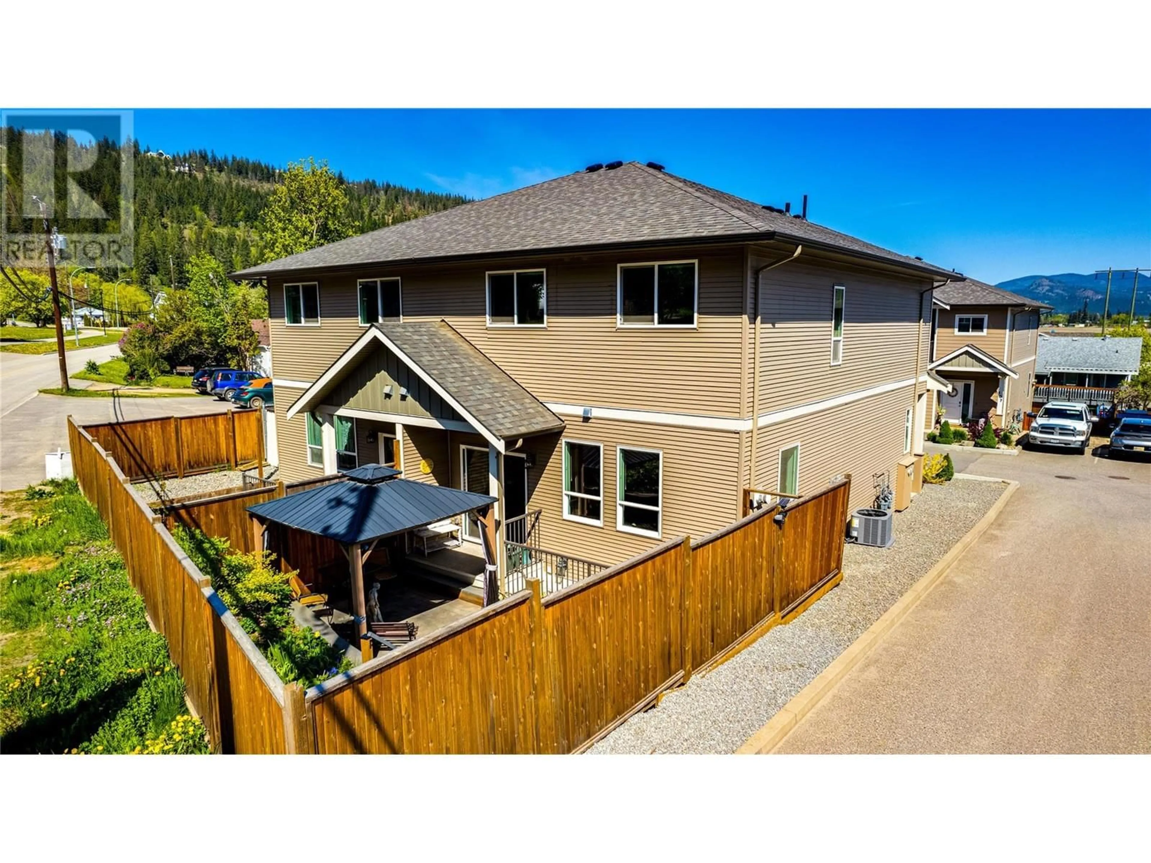 A pic from outside/outdoor area/front of a property/back of a property/a pic from drone, mountain view for 108 - 173 SALMON ARM DRIVE, Enderby British Columbia V0E1V1