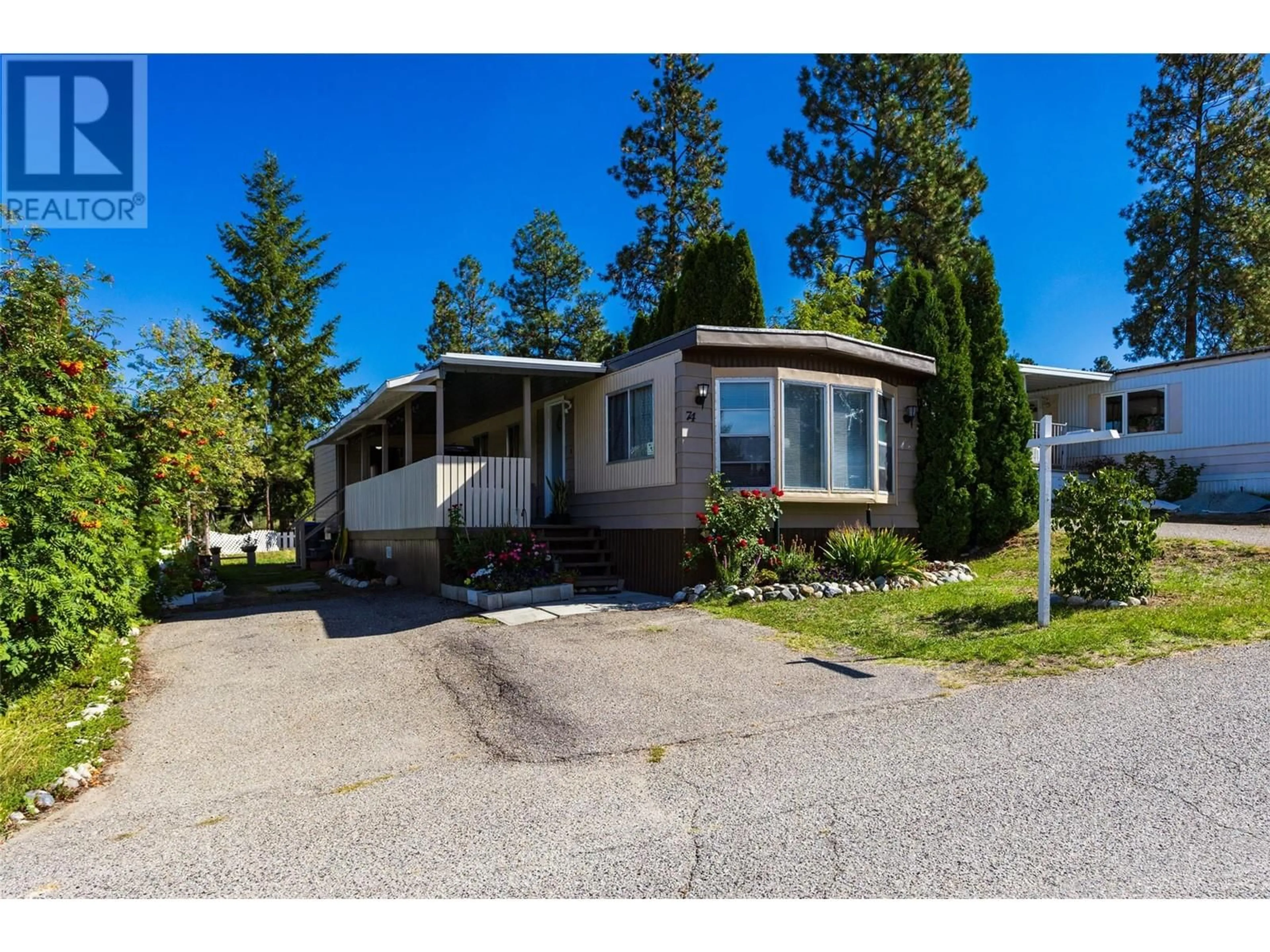 Home with vinyl exterior material, street for 74 - 3535 MCCULLOCH ROAD, Kelowna British Columbia V1W4R6