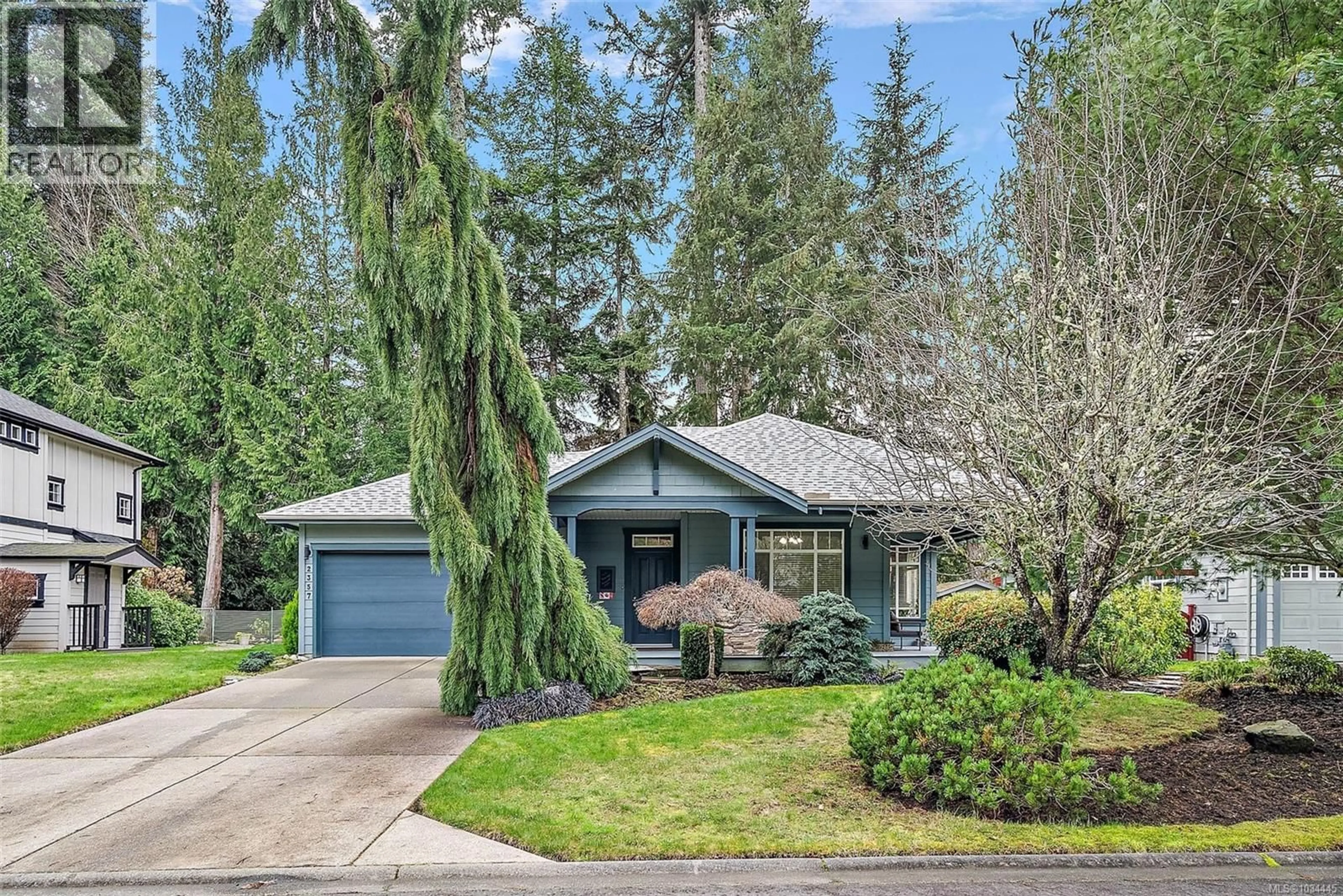 Home with vinyl exterior material, street for 2357 DEMAMIEL DRIVE, Sooke British Columbia V9Z0Y4