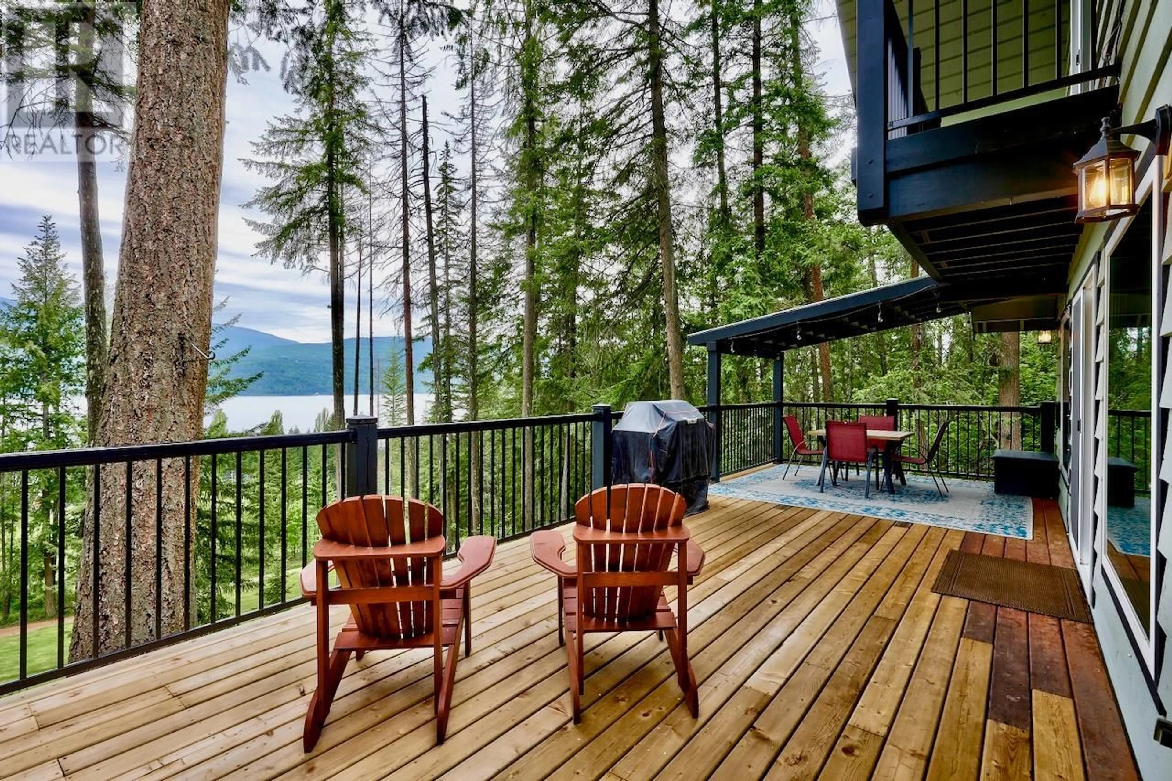 Patio, forest/trees view for 7730 COLUMBIA DRIVE, Anglemont British Columbia V0E1M8