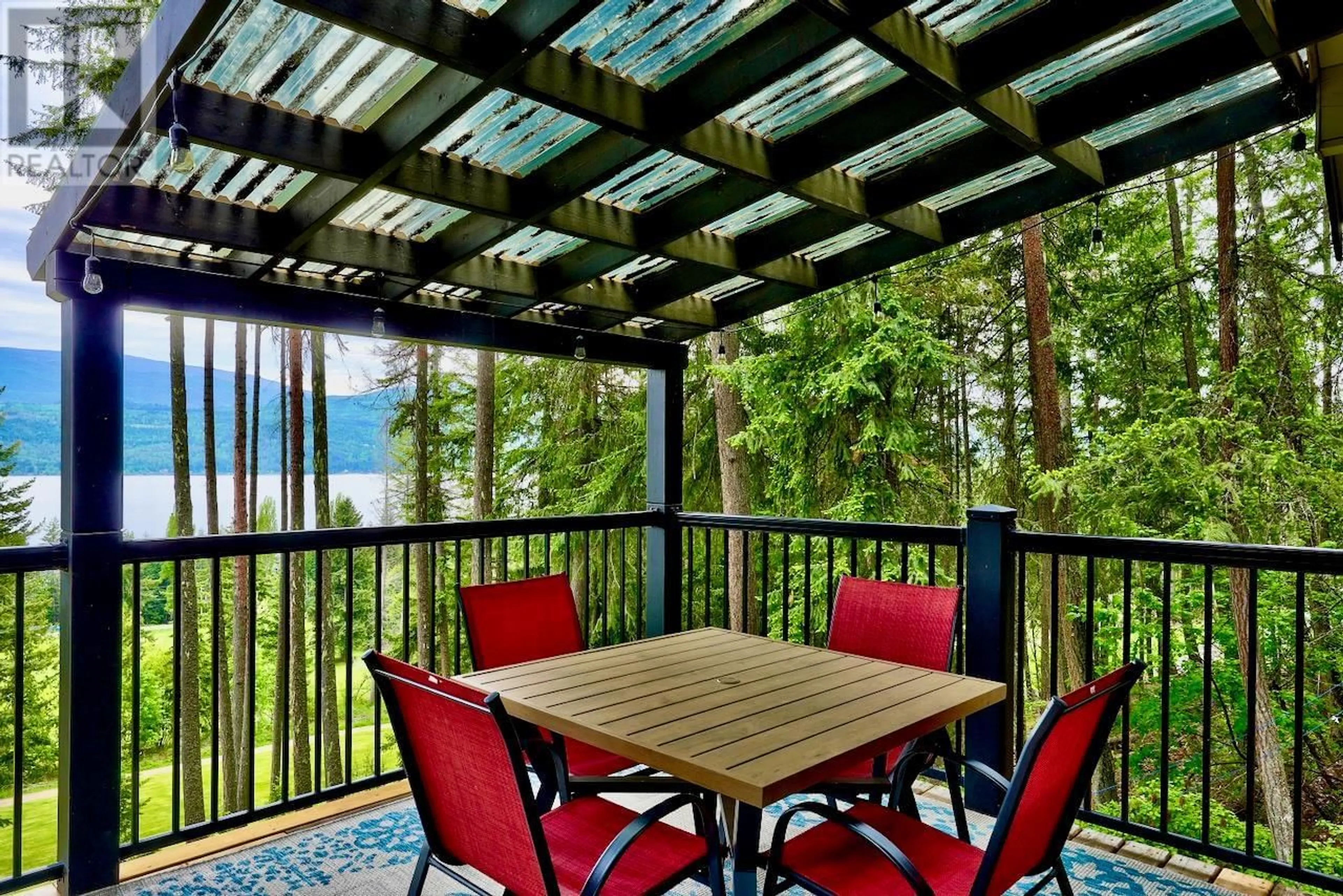 Patio, water/lake/river/ocean view for 7730 COLUMBIA DRIVE, Anglemont British Columbia V0E1M8