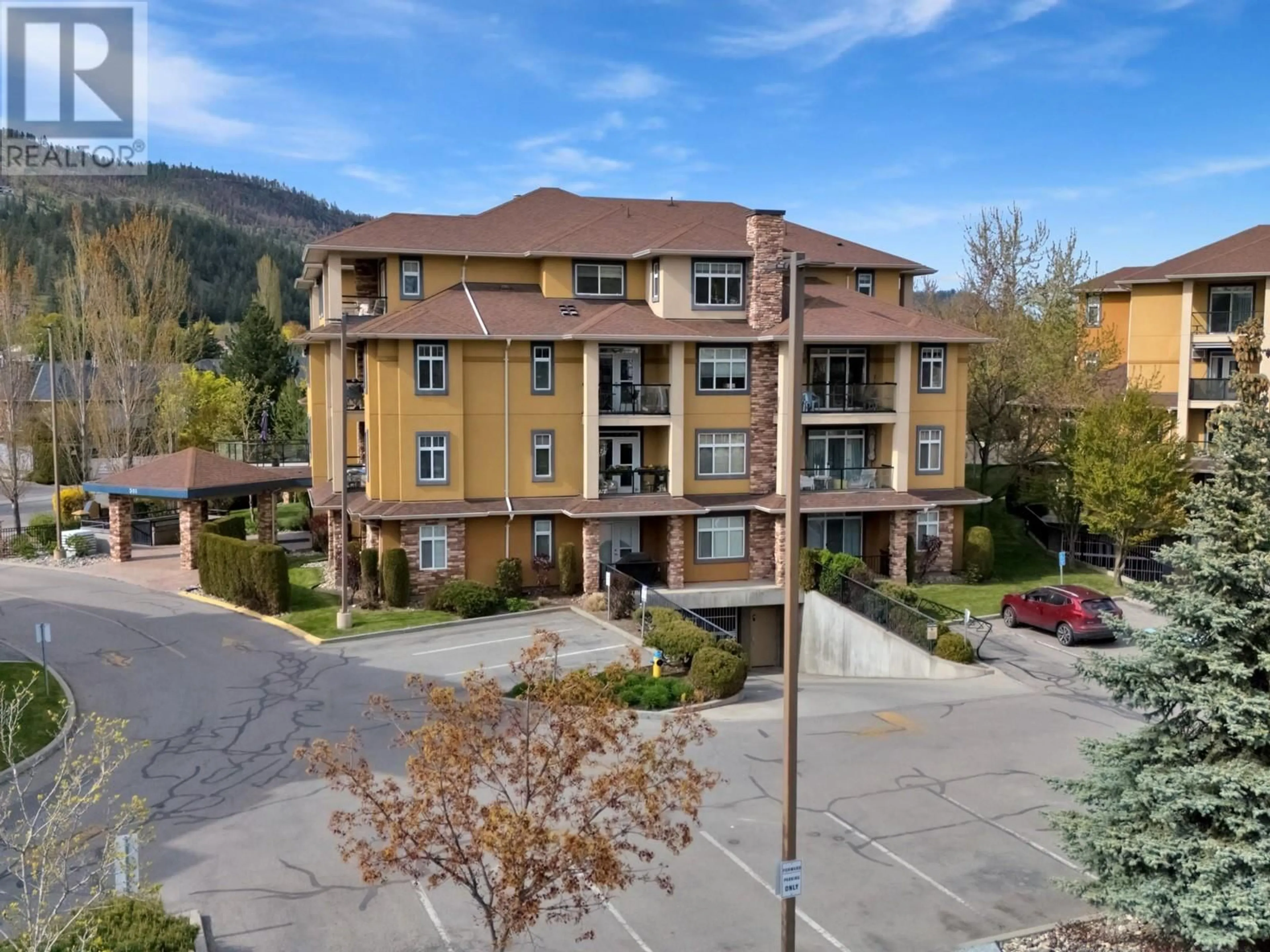 A pic from outside/outdoor area/front of a property/back of a property/a pic from drone, mountain view for 205 - 305 WHITMAN ROAD, Kelowna British Columbia V1V2P3