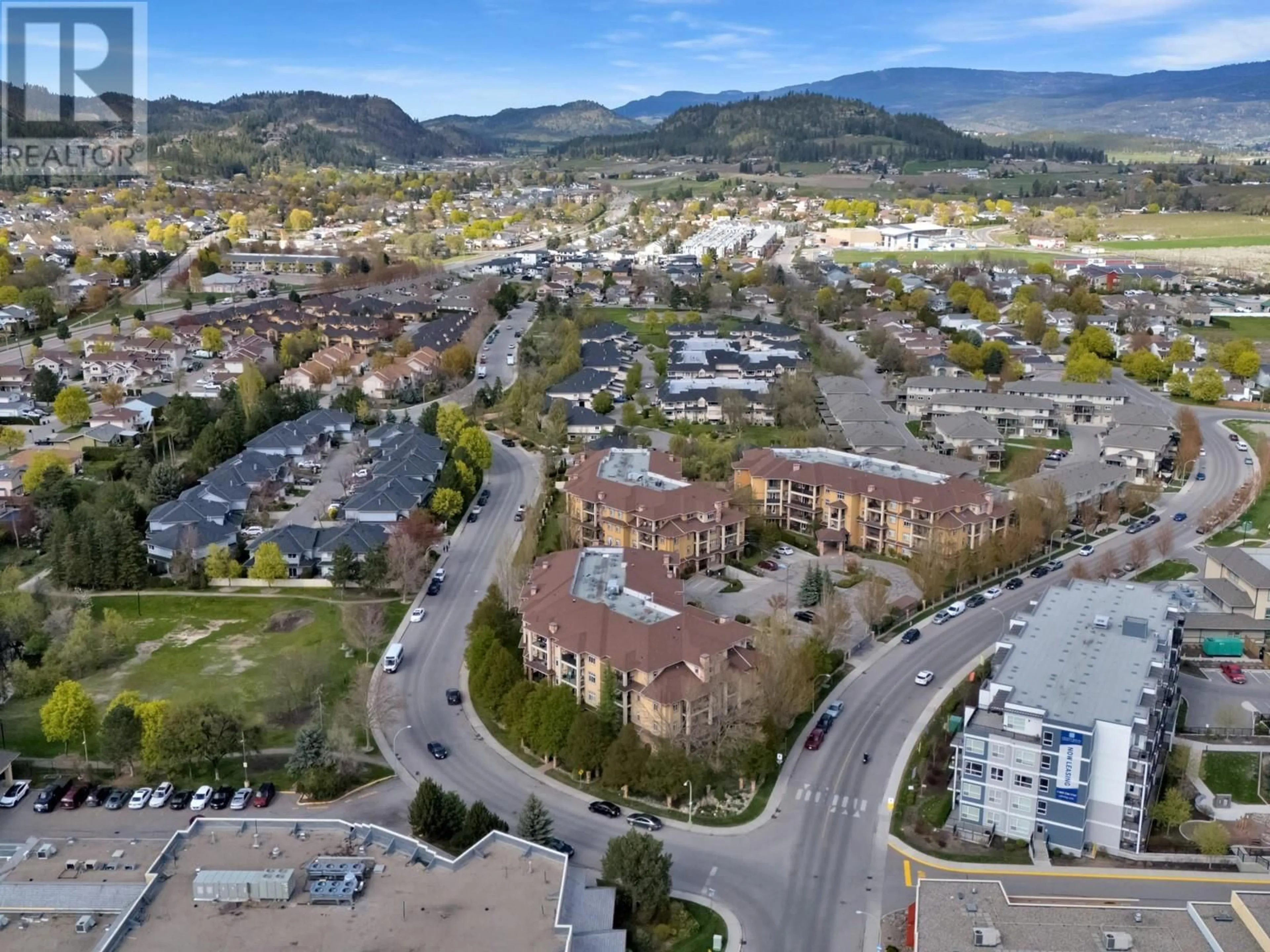 A pic from outside/outdoor area/front of a property/back of a property/a pic from drone, mountain view for 205 - 305 WHITMAN ROAD, Kelowna British Columbia V1V2P3