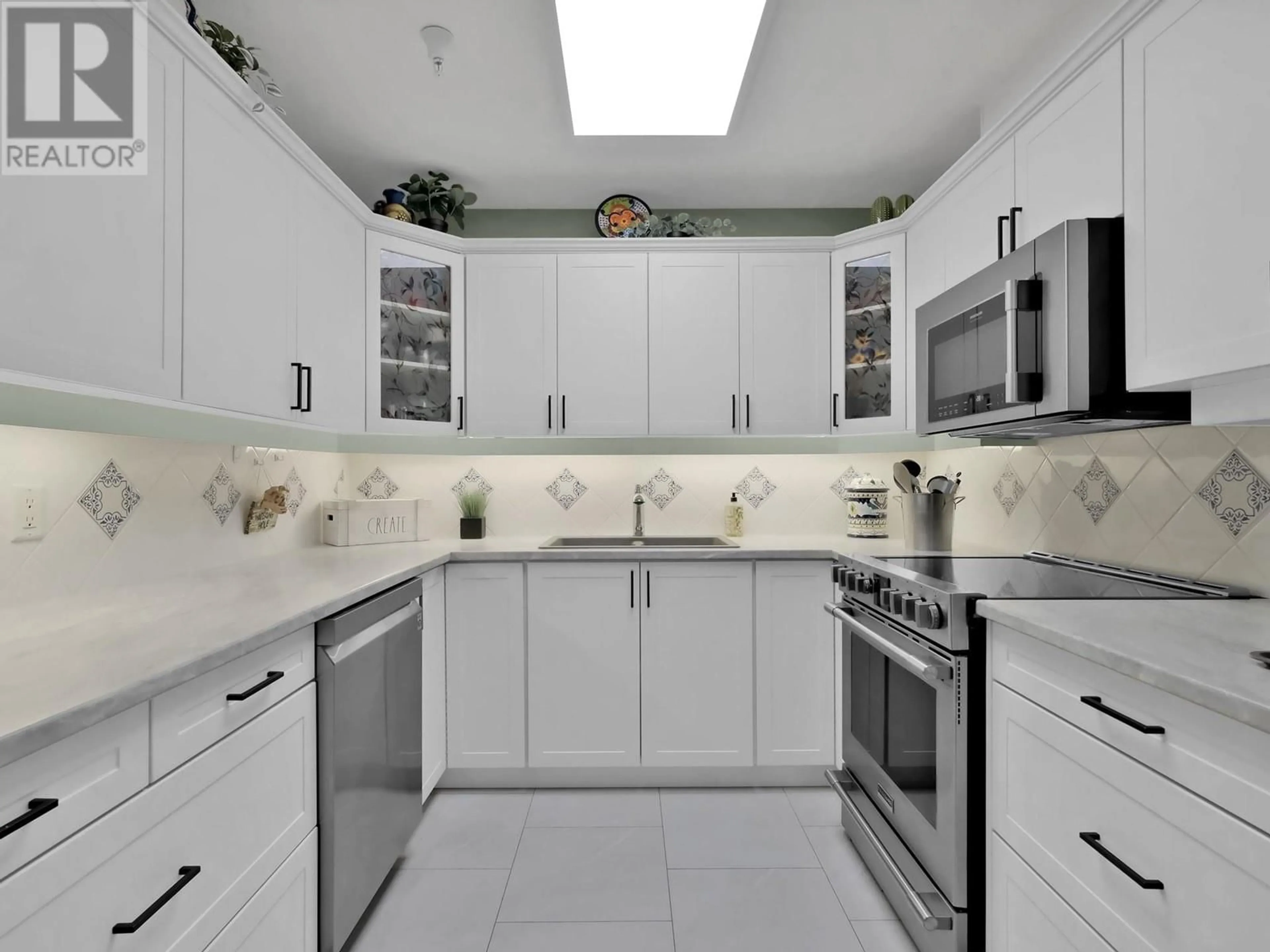 Contemporary kitchen, ceramic/tile floor for 205 - 305 WHITMAN ROAD, Kelowna British Columbia V1V2P3