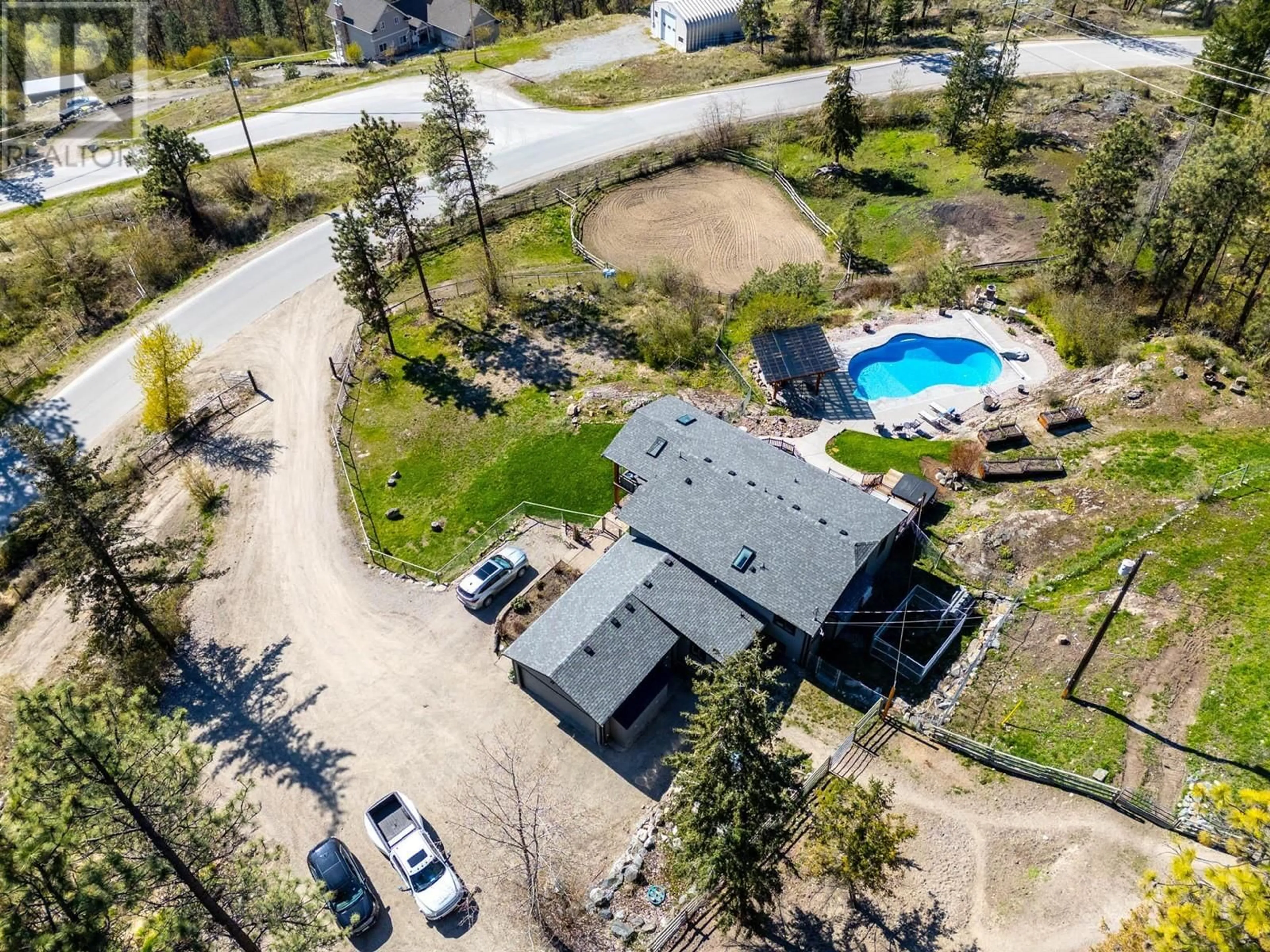 A pic from outside/outdoor area/front of a property/back of a property/a pic from drone, unknown for 6025 FARMERS DRIVE, Kelowna British Columbia V1P1A3