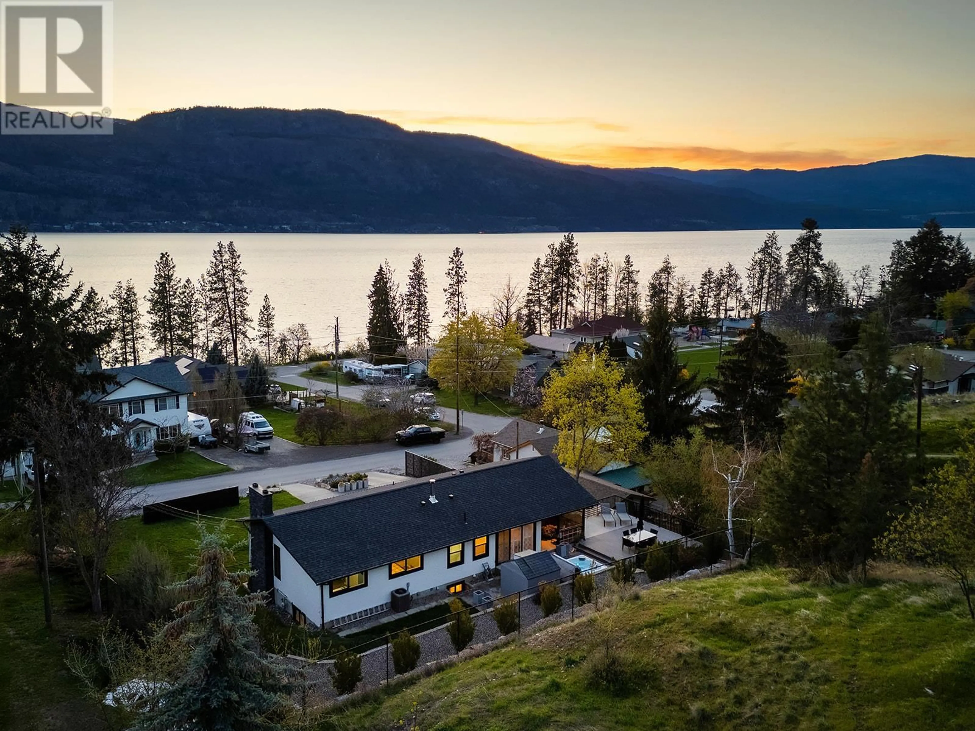 A pic from outside/outdoor area/front of a property/back of a property/a pic from drone, water/lake/river/ocean view for 11175 MADDOCK AVENUE, Lake Country British Columbia V4V2J7