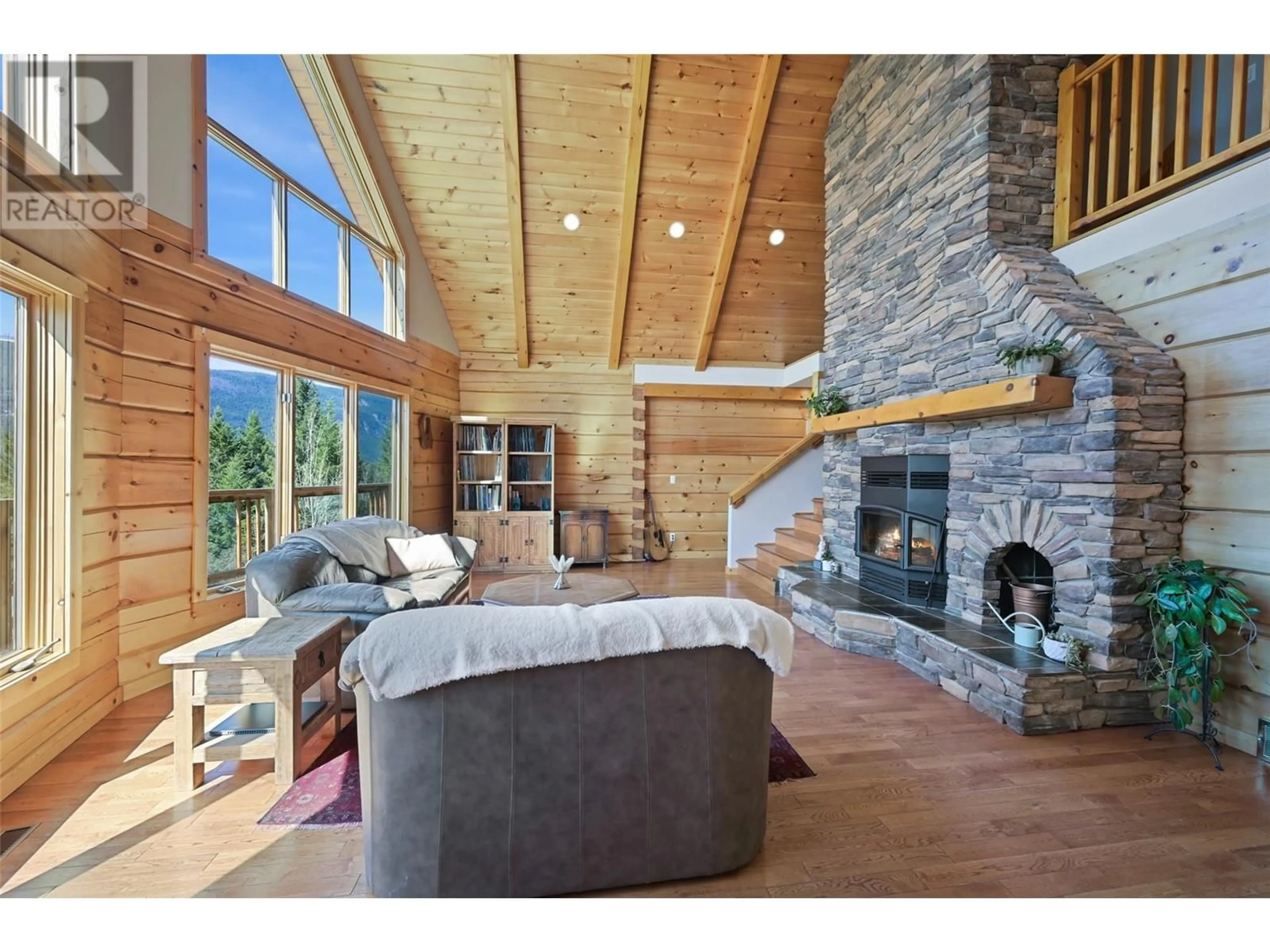 Living room with furniture, wood/laminate floor for 110 HIGHWAY 95 OTHER, Spillimacheen British Columbia V0A1P0