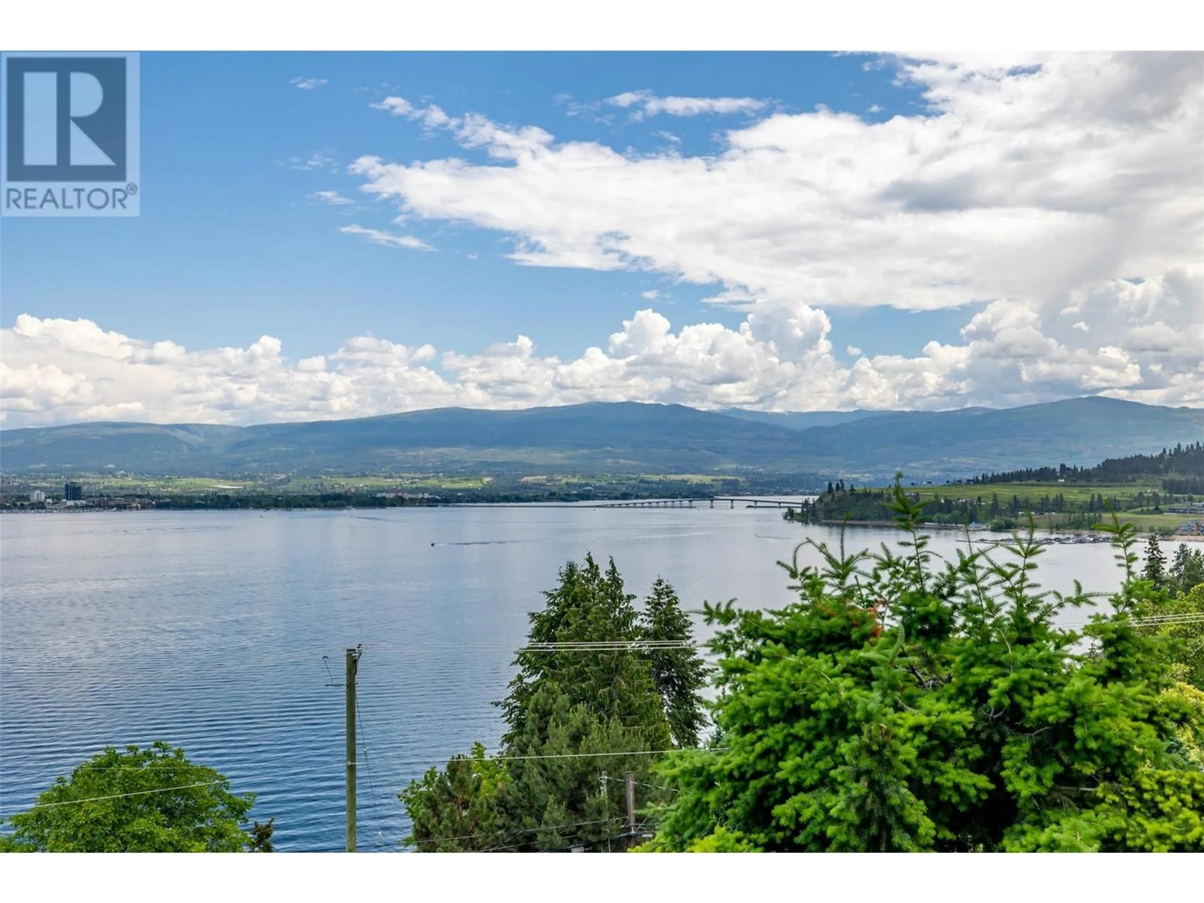 A pic from outside/outdoor area/front of a property/back of a property/a pic from drone, water/lake/river/ocean view for 1084 WESTSIDE ROAD SOUTH, West Kelowna British Columbia V1Z3S1