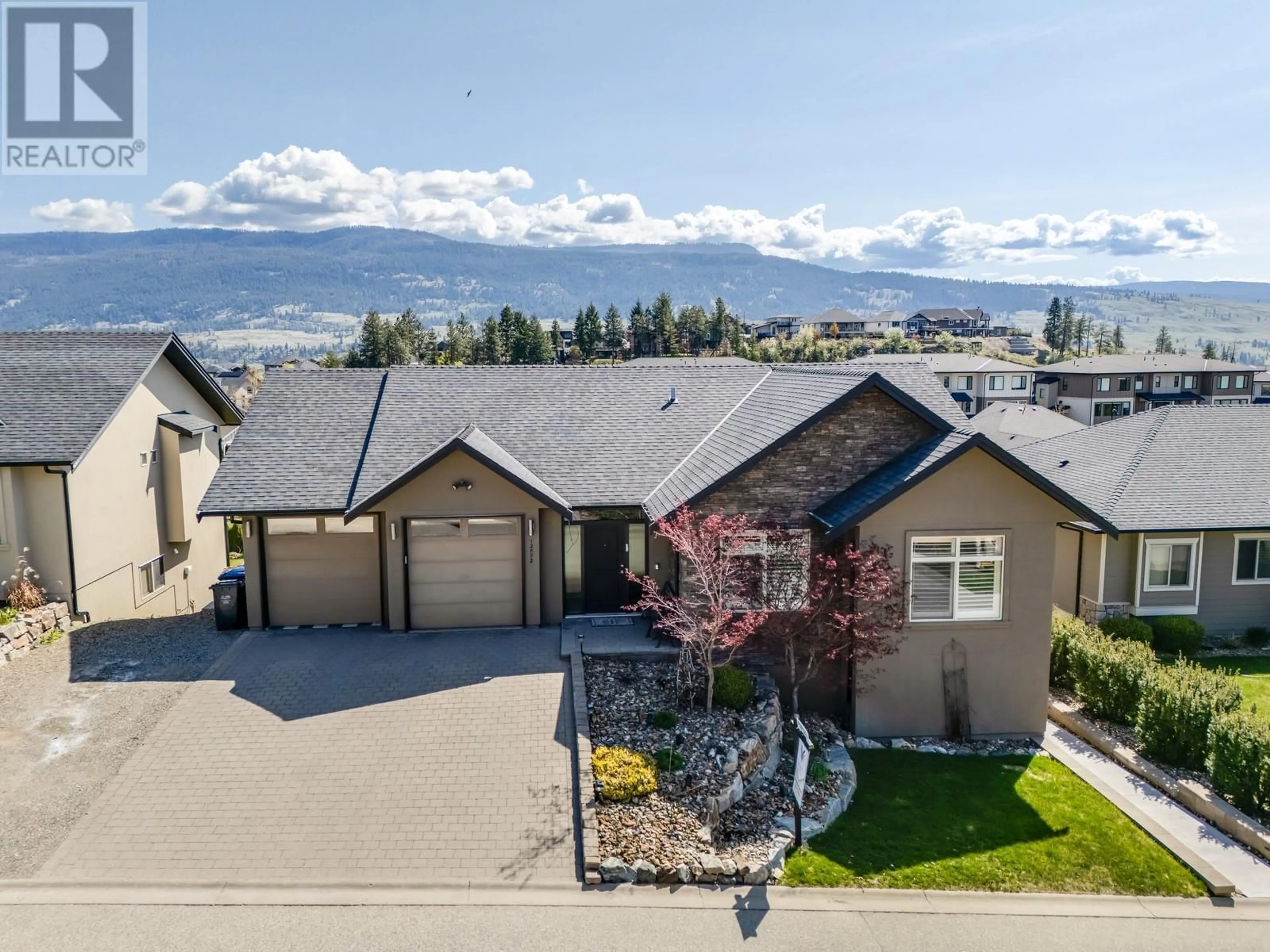 A pic from outside/outdoor area/front of a property/back of a property/a pic from drone, mountain view for 12872 LAKE HILL DRIVE, Lake Country British Columbia V4V2P7