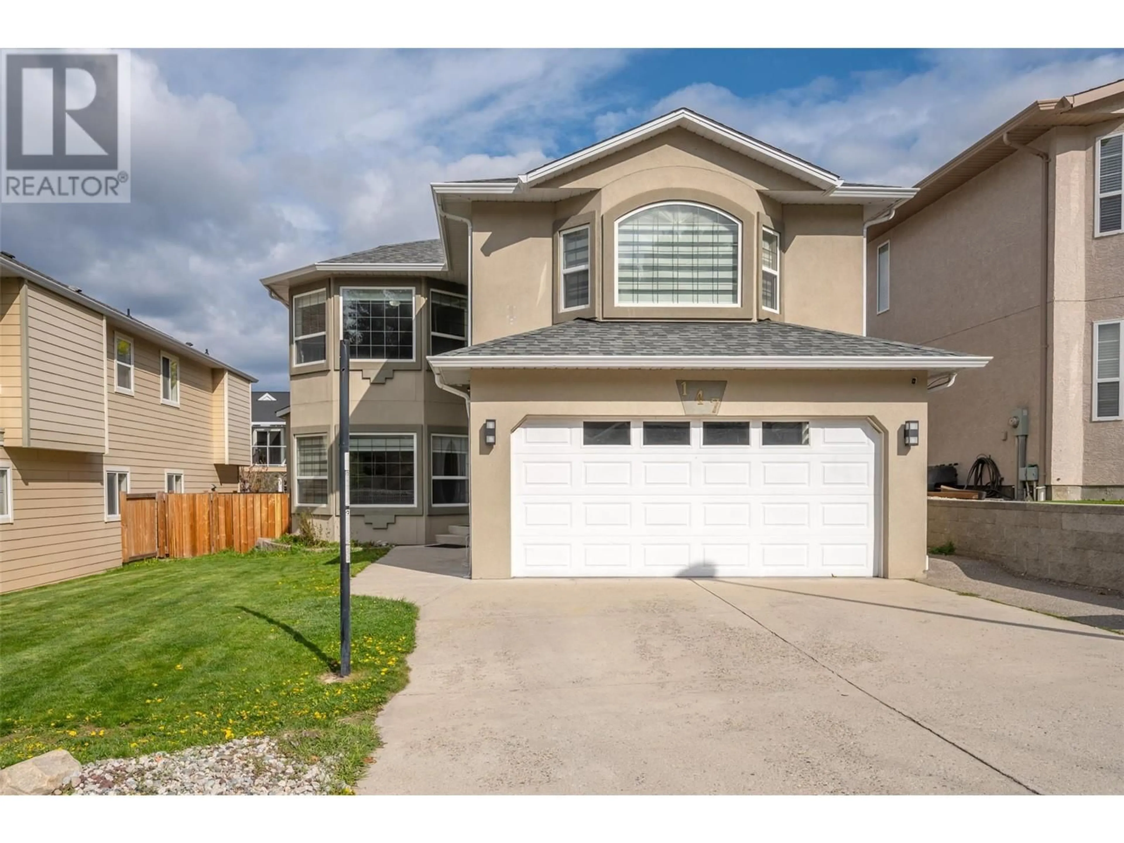 Home with vinyl exterior material, street for 147 STOCKS CRESCENT, Penticton British Columbia V2A8P6