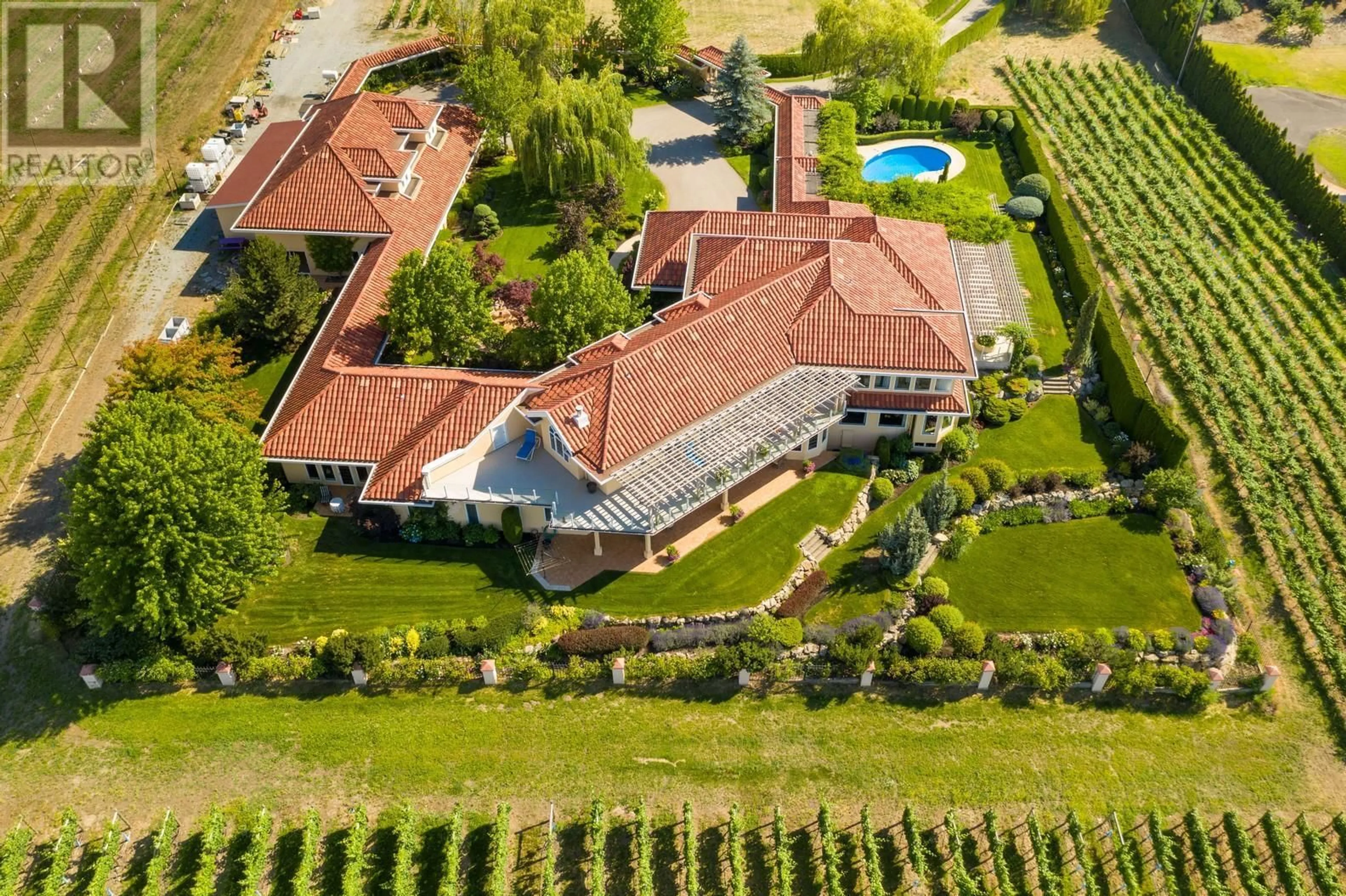 A pic from outside/outdoor area/front of a property/back of a property/a pic from drone, unknown for 3240 POOLEY ROAD, Kelowna British Columbia V1W4G7