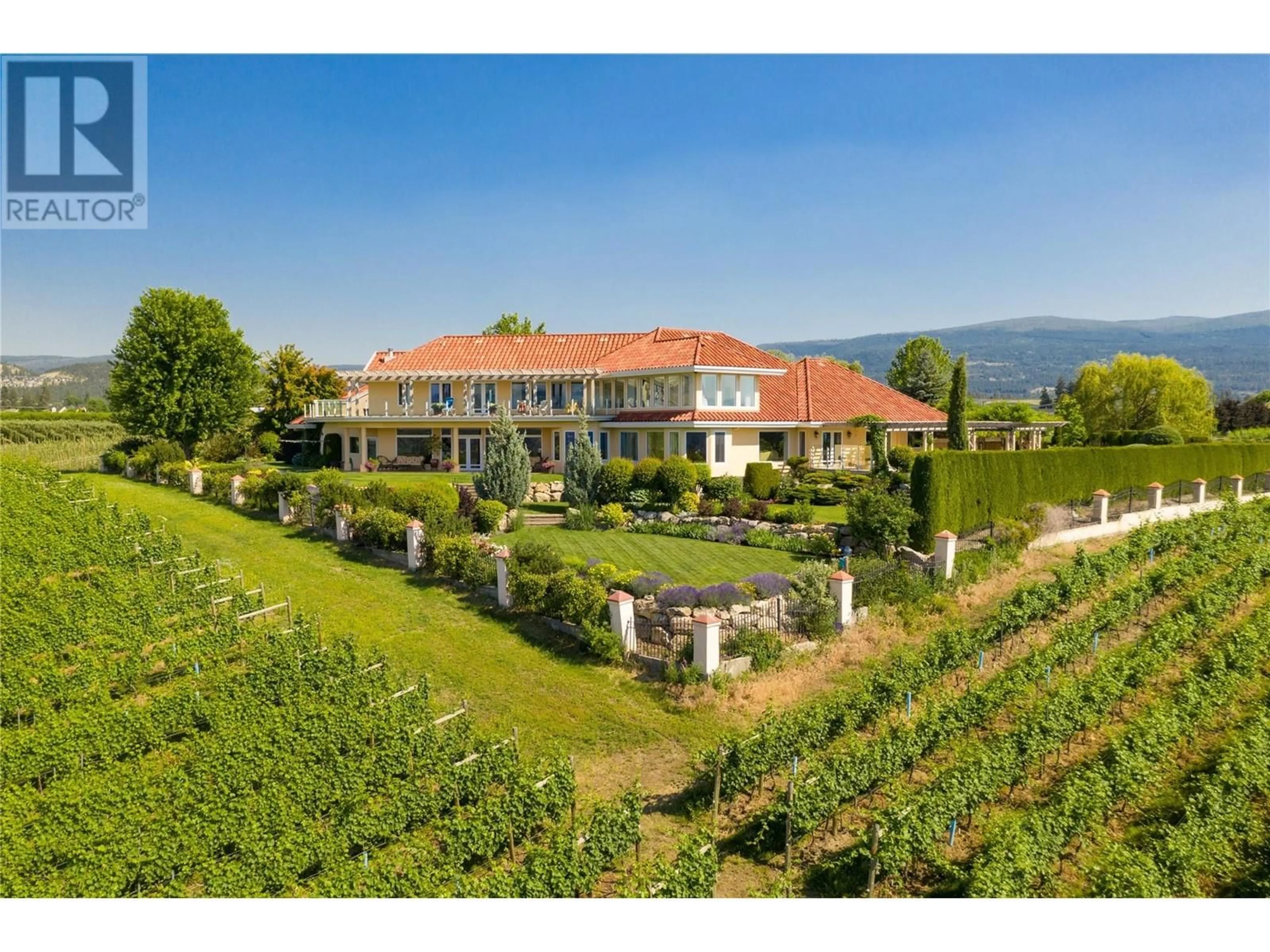 A pic from outside/outdoor area/front of a property/back of a property/a pic from drone, mountain view for 3240 POOLEY ROAD, Kelowna British Columbia V1W4G7