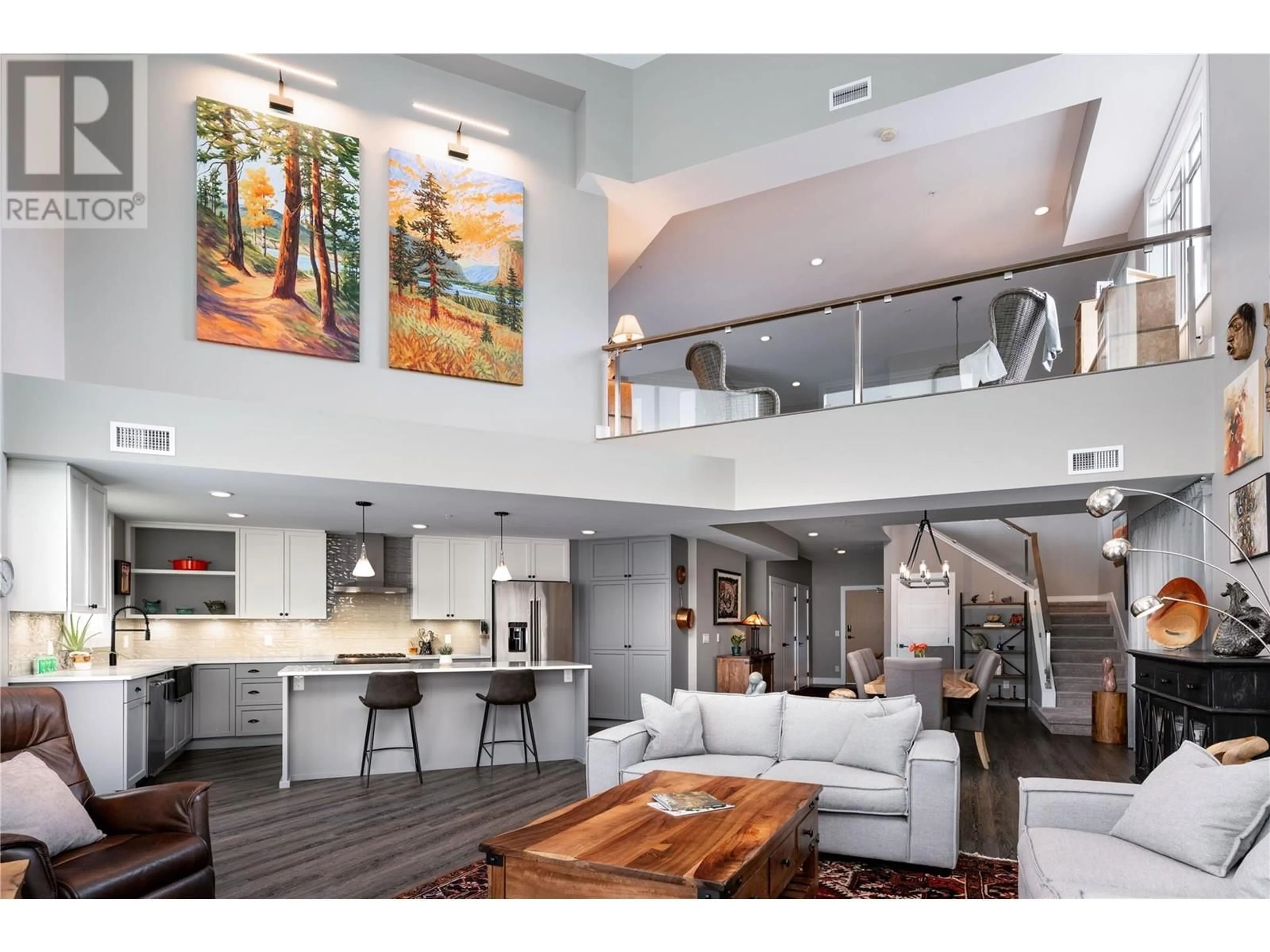 Open concept kitchen, wood/laminate floor for 501 - 529 TRUSWELL ROAD, Kelowna British Columbia V1W3K7