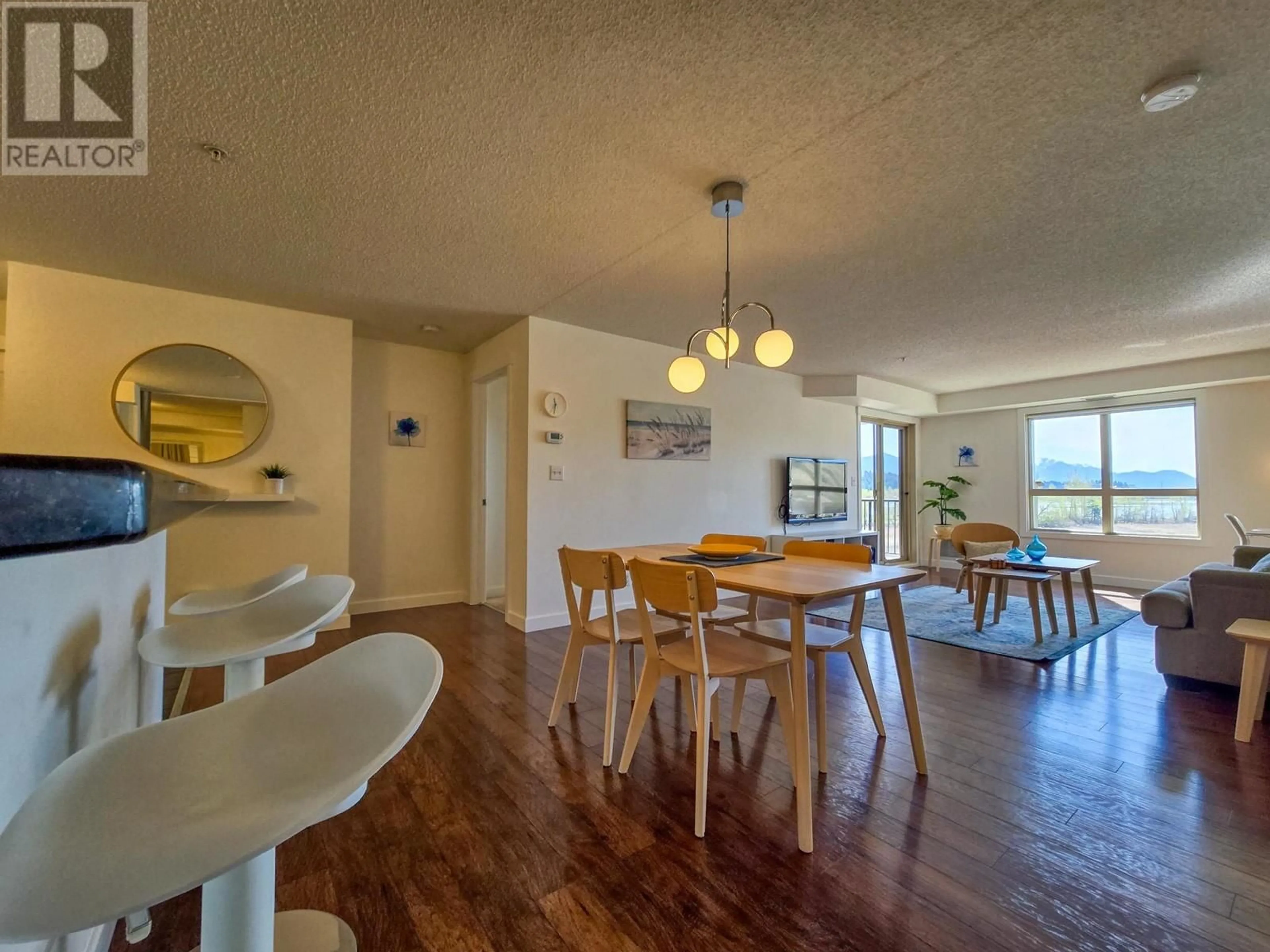 Dining room, wood/laminate floor for 1306 - 205 THIRD AVENUE, Invermere British Columbia V0A1K7
