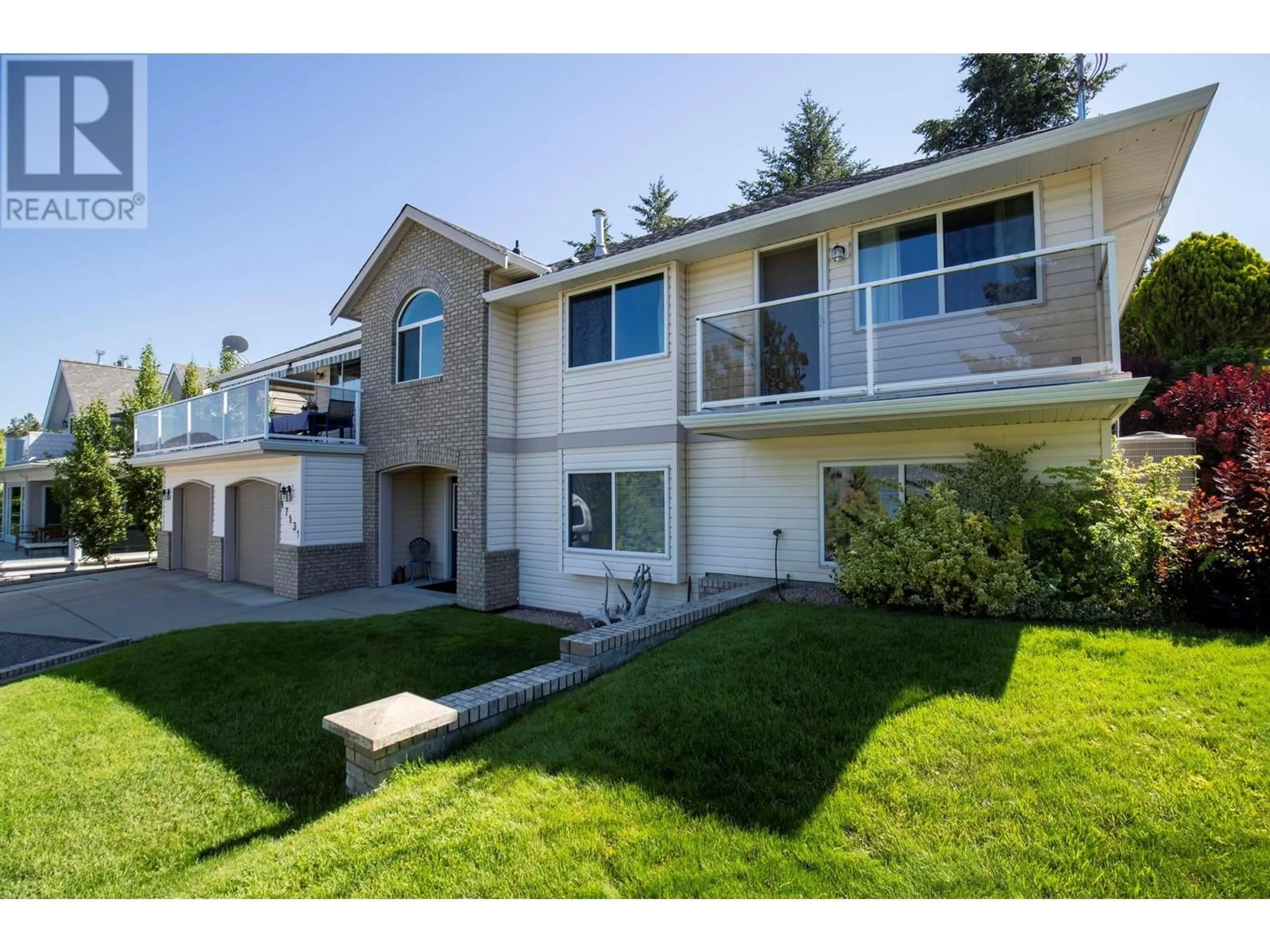 Home with vinyl exterior material, street for 17131 CORAL BEACH ROAD, Lake Country British Columbia V4V1B9