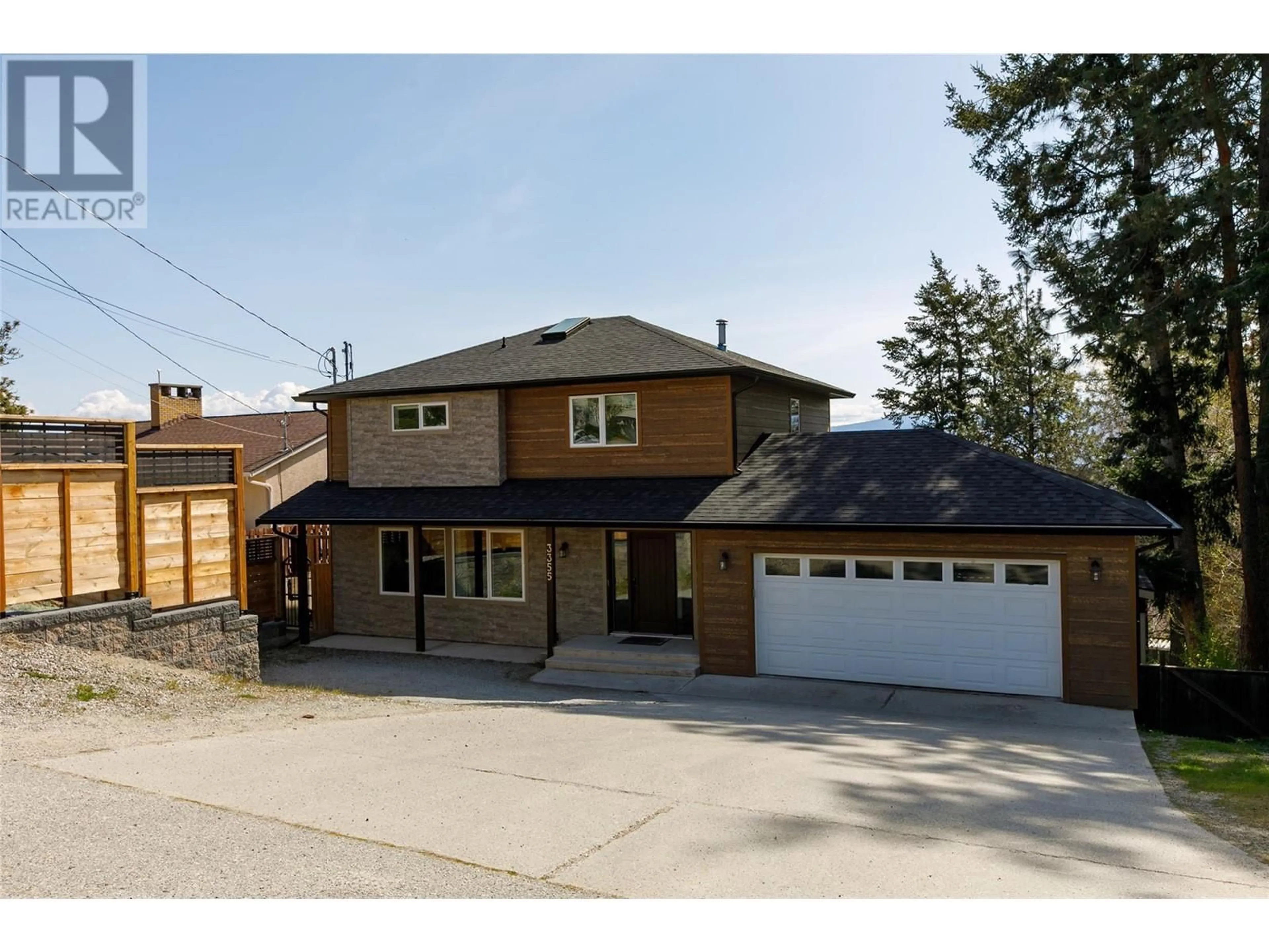 Home with brick exterior material, street for 3355 MCGINNIS ROAD, West Kelowna British Columbia V4T1B5