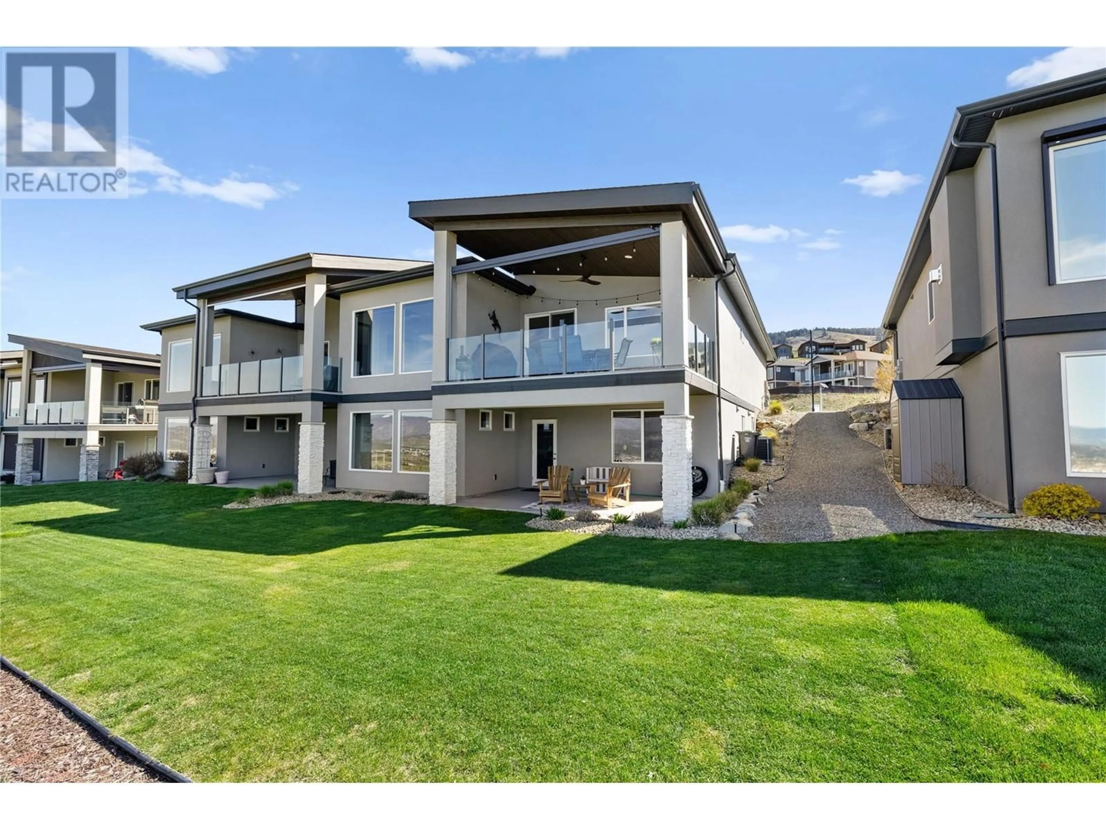 A pic from outside/outdoor area/front of a property/back of a property/a pic from drone, unknown for 1950 TALLGRASS TRAIL, Kelowna British Columbia V1P1T7