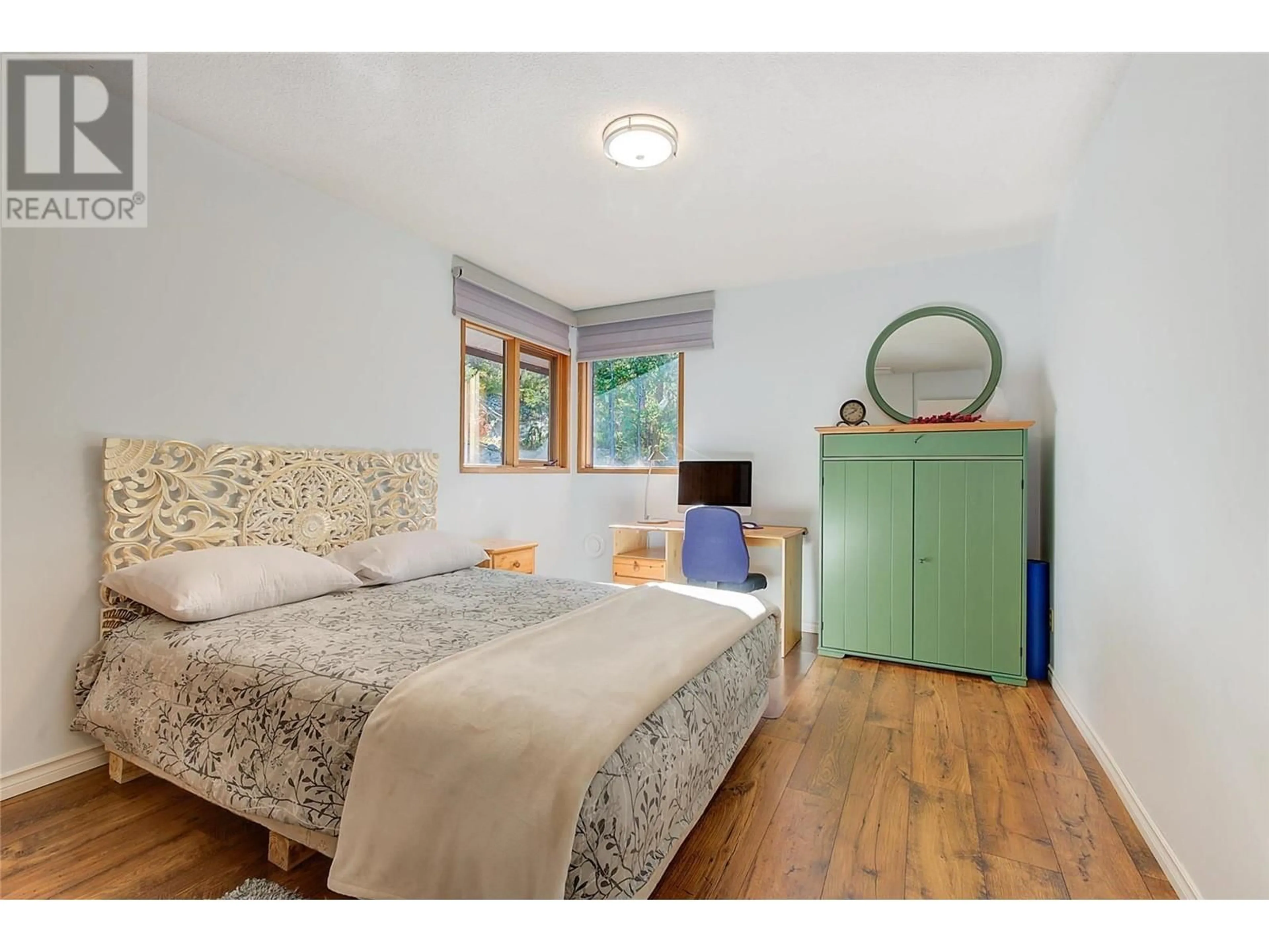 Bedroom with bed, wood/laminate floor for 4386 FINCH ROAD, Lake Country British Columbia V4V1N6