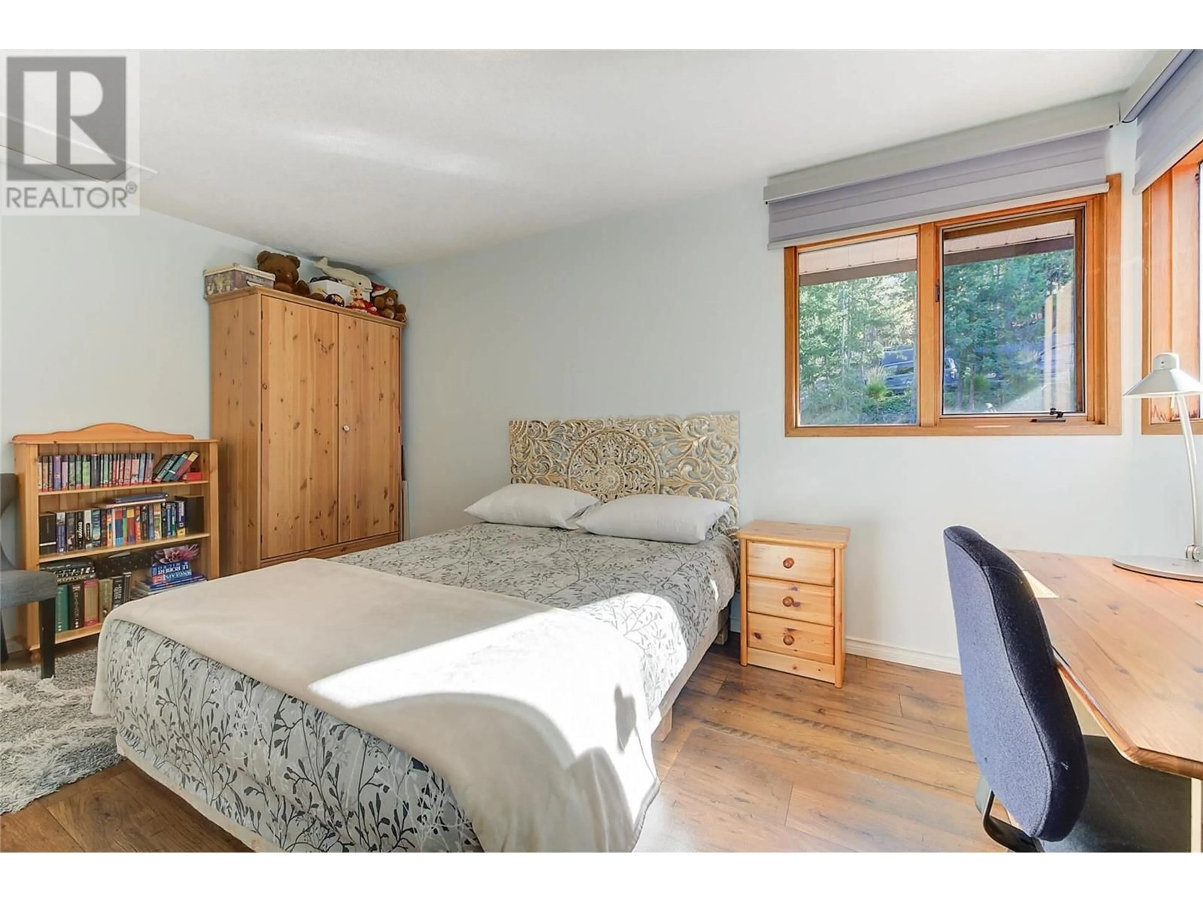 Bedroom with bed, wood/laminate floor for 4386 FINCH ROAD, Lake Country British Columbia V4V1N6
