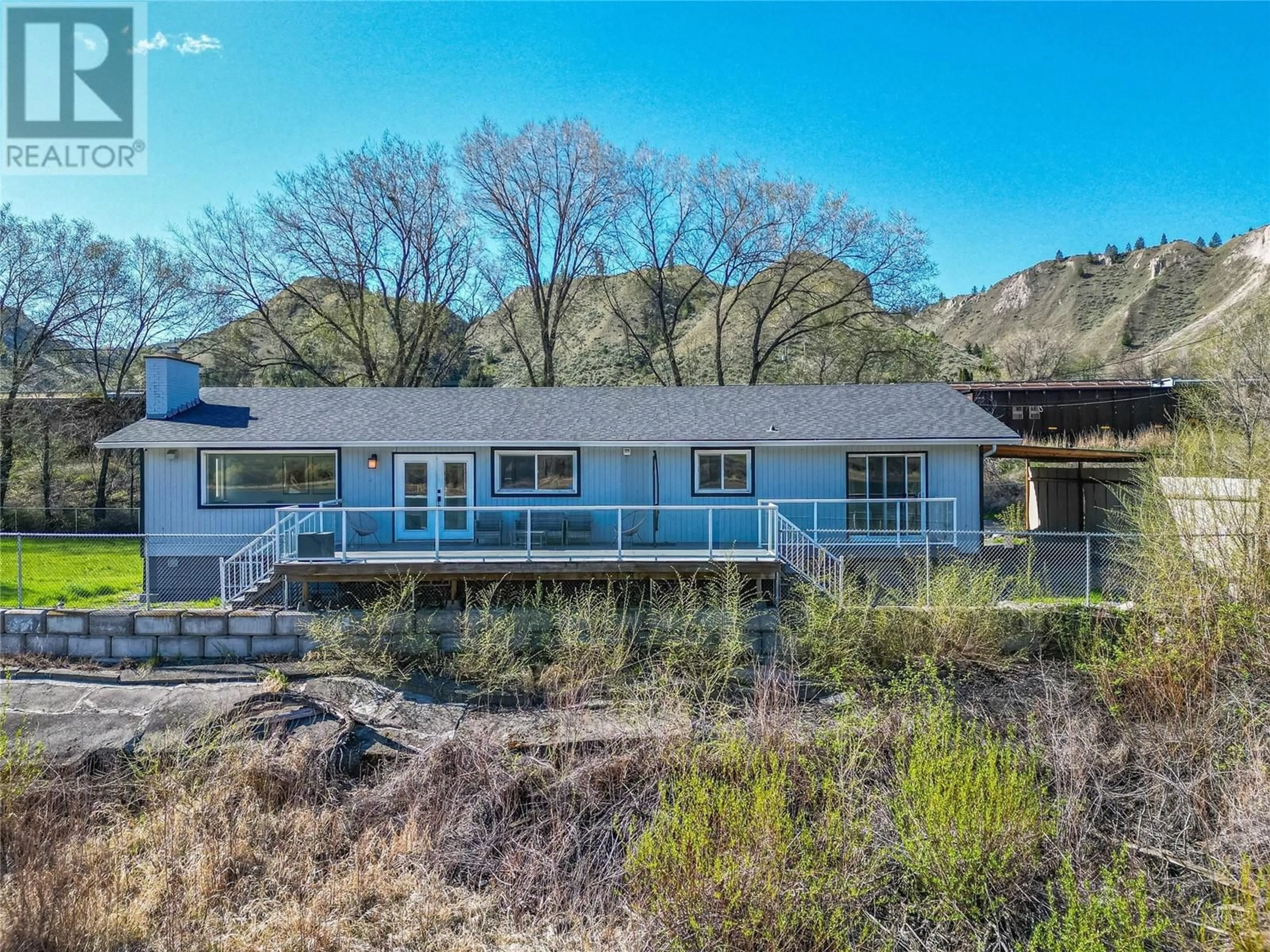 A pic from outside/outdoor area/front of a property/back of a property/a pic from drone, water/lake/river/ocean view for 7250 FURRER ROAD, Kamloops British Columbia V2C5T5