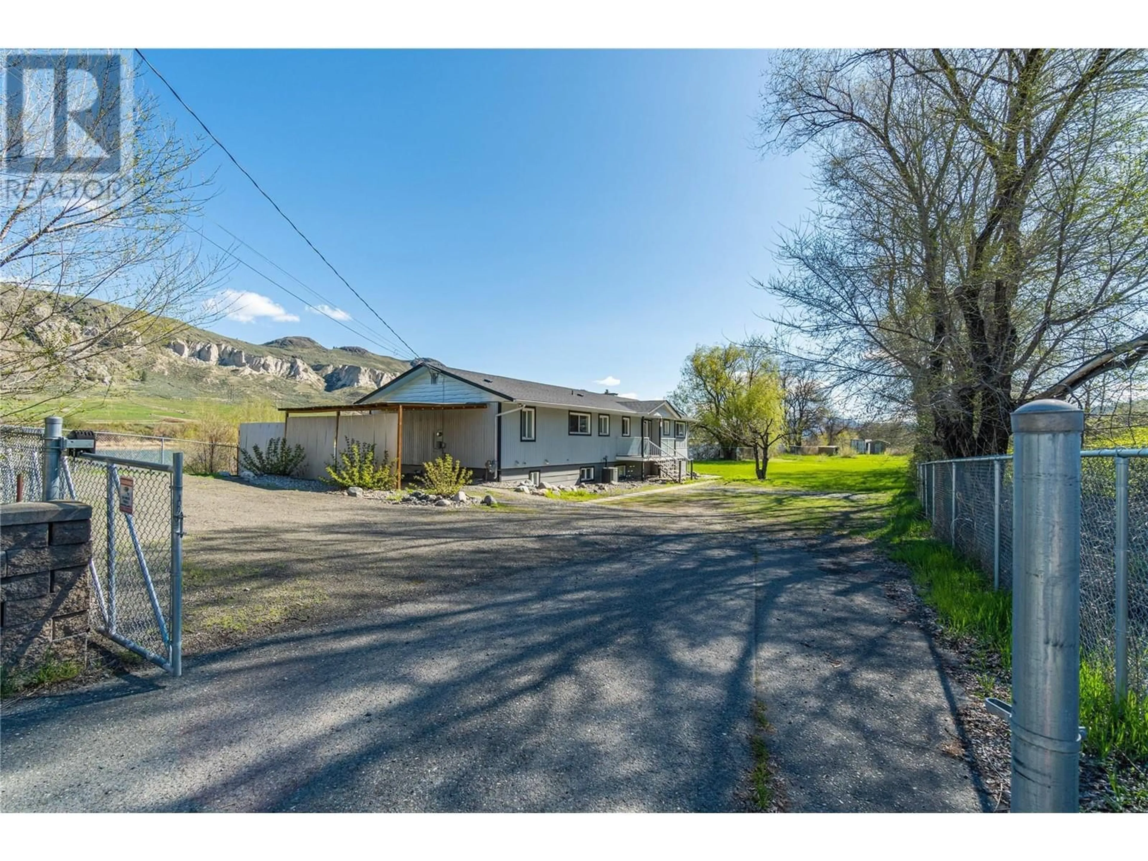 A pic from outside/outdoor area/front of a property/back of a property/a pic from drone, street for 7250 FURRER ROAD, Kamloops British Columbia V2C5T5