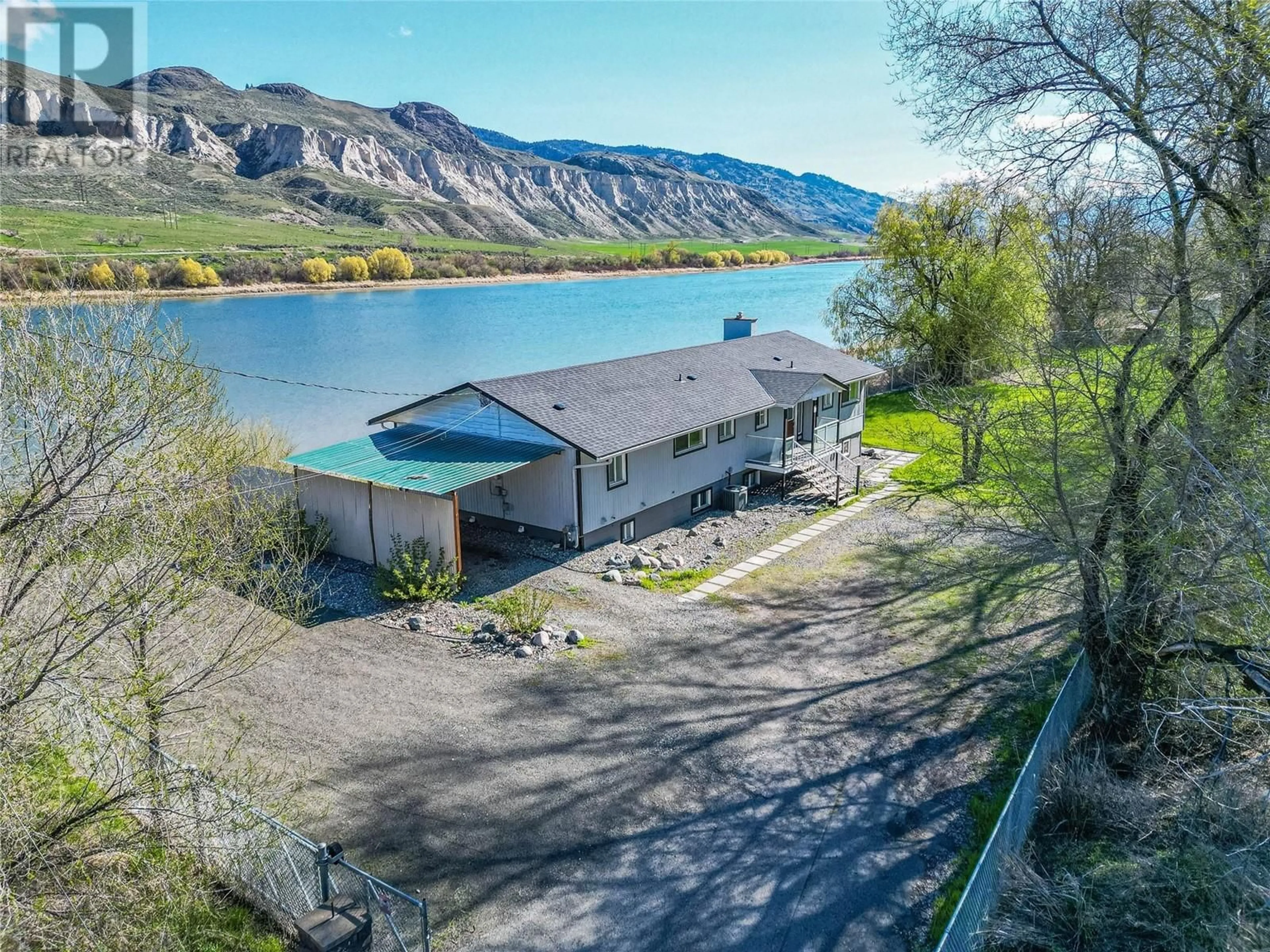 A pic from outside/outdoor area/front of a property/back of a property/a pic from drone, water/lake/river/ocean view for 7250 FURRER ROAD, Kamloops British Columbia V2C5T5