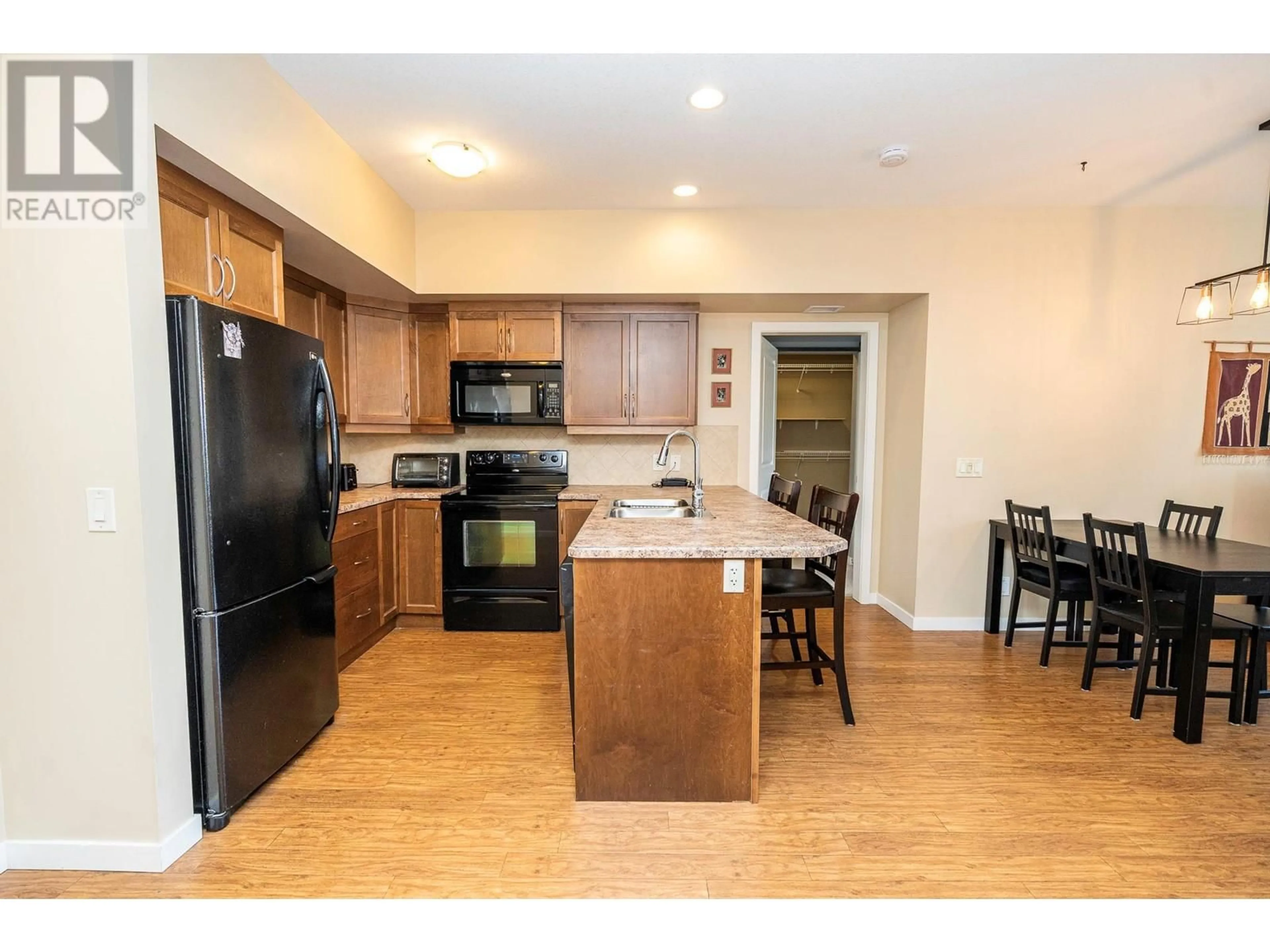 Standard kitchen, wood/laminate floor for 223 - 850 SAUCIER AVENUE, Kelowna British Columbia V1Y6A3