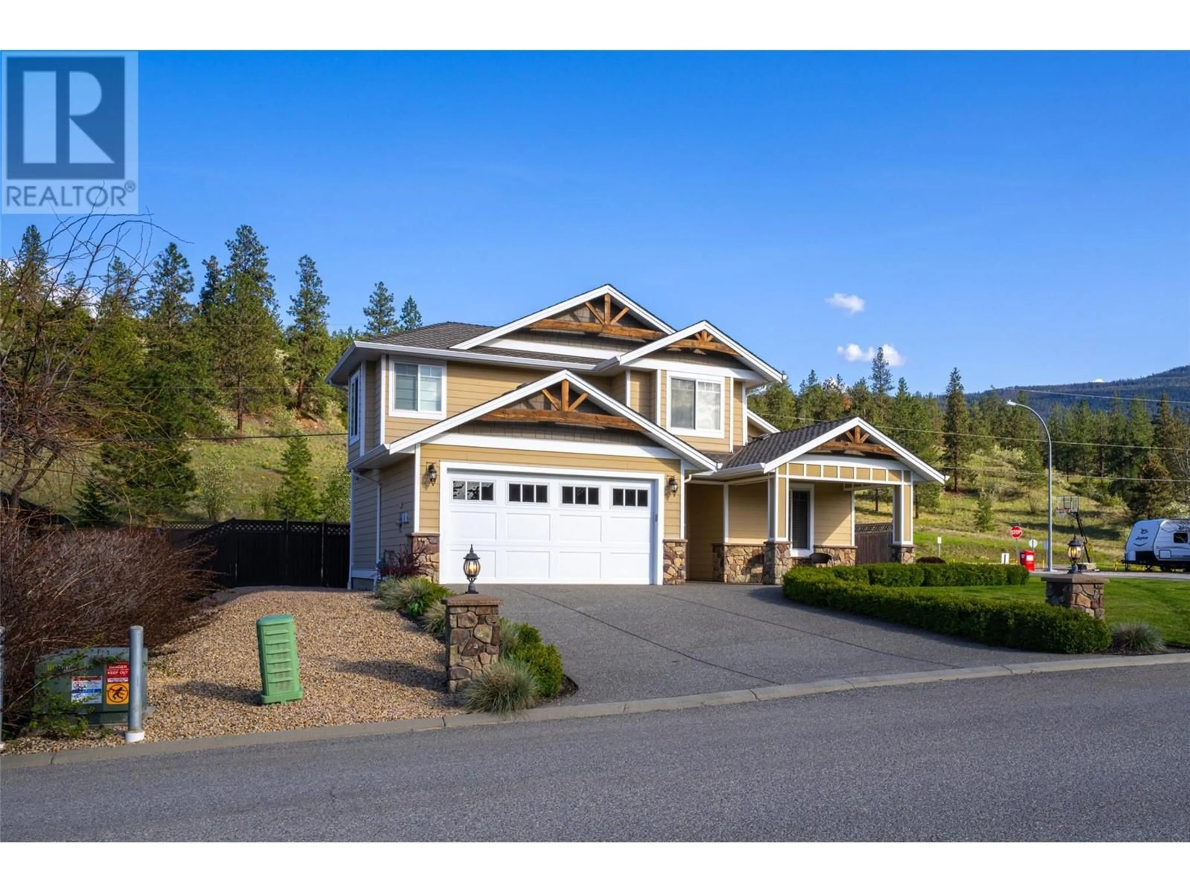 Home with vinyl exterior material, street for 14361 INVERCRAIG PLACE, Coldstream British Columbia V1B4A6