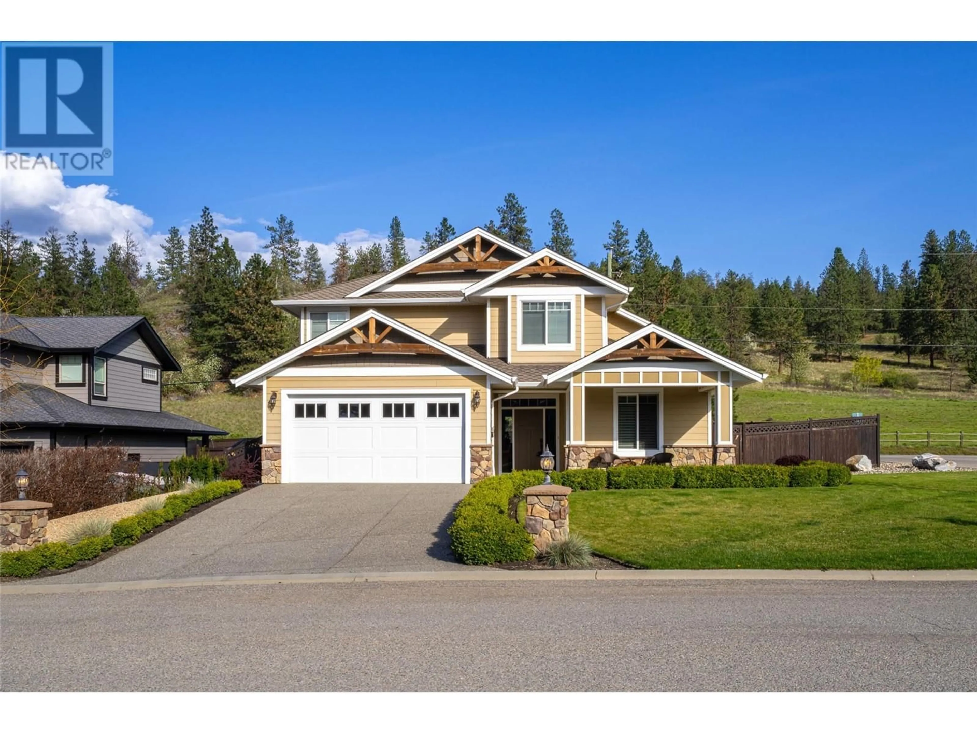 Home with vinyl exterior material, street for 14361 INVERCRAIG PLACE, Coldstream British Columbia V1B4A6