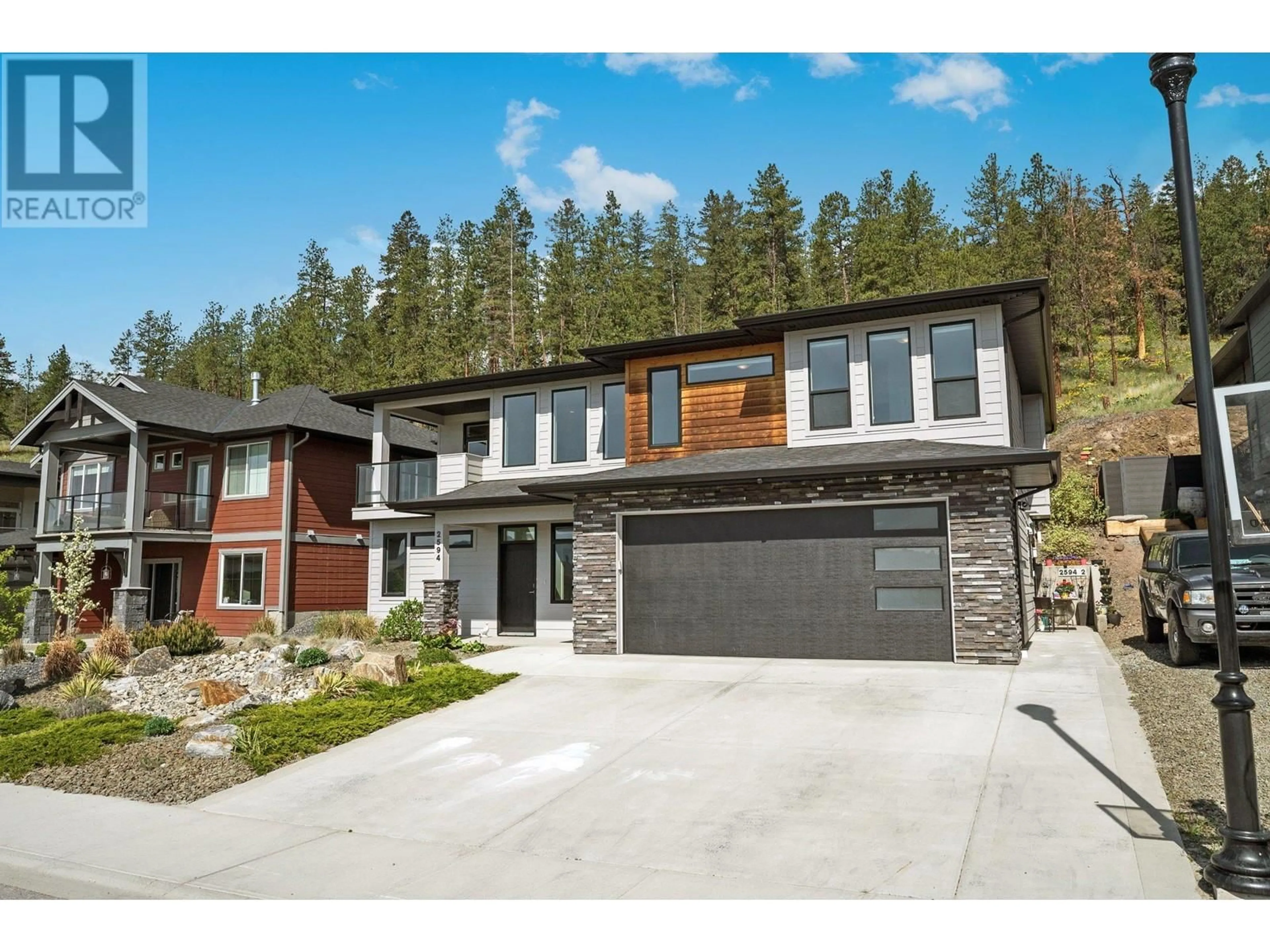 Home with brick exterior material, unknown for 2594 CROWN CREST DRIVE, West Kelowna British Columbia V4T3N3